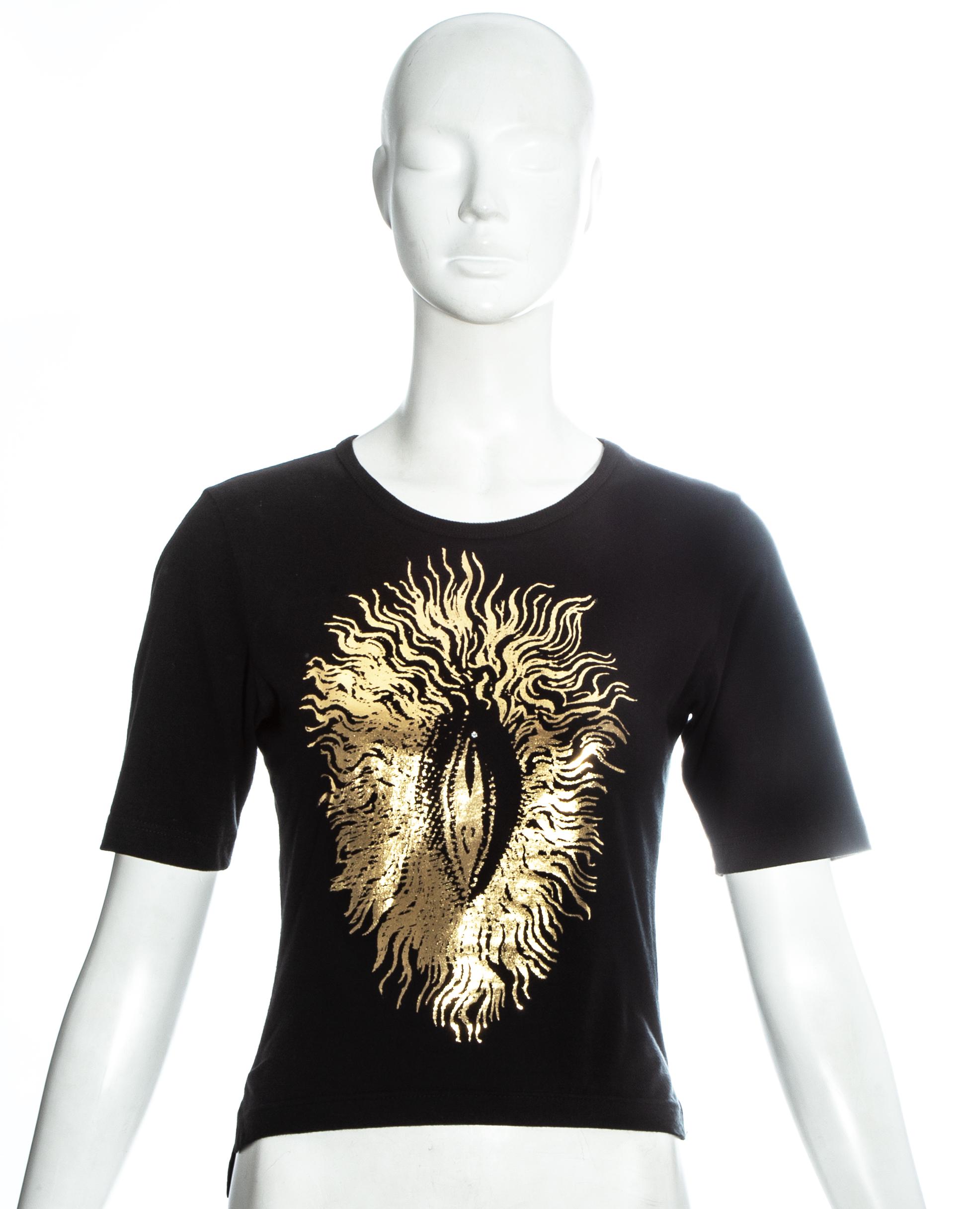 Vivienne Westwood black cotton t-shirt with gold foil vagina print with rhinestone clitoris and embroidered orb at the back

Cafe Society, Spring-Summer 1994