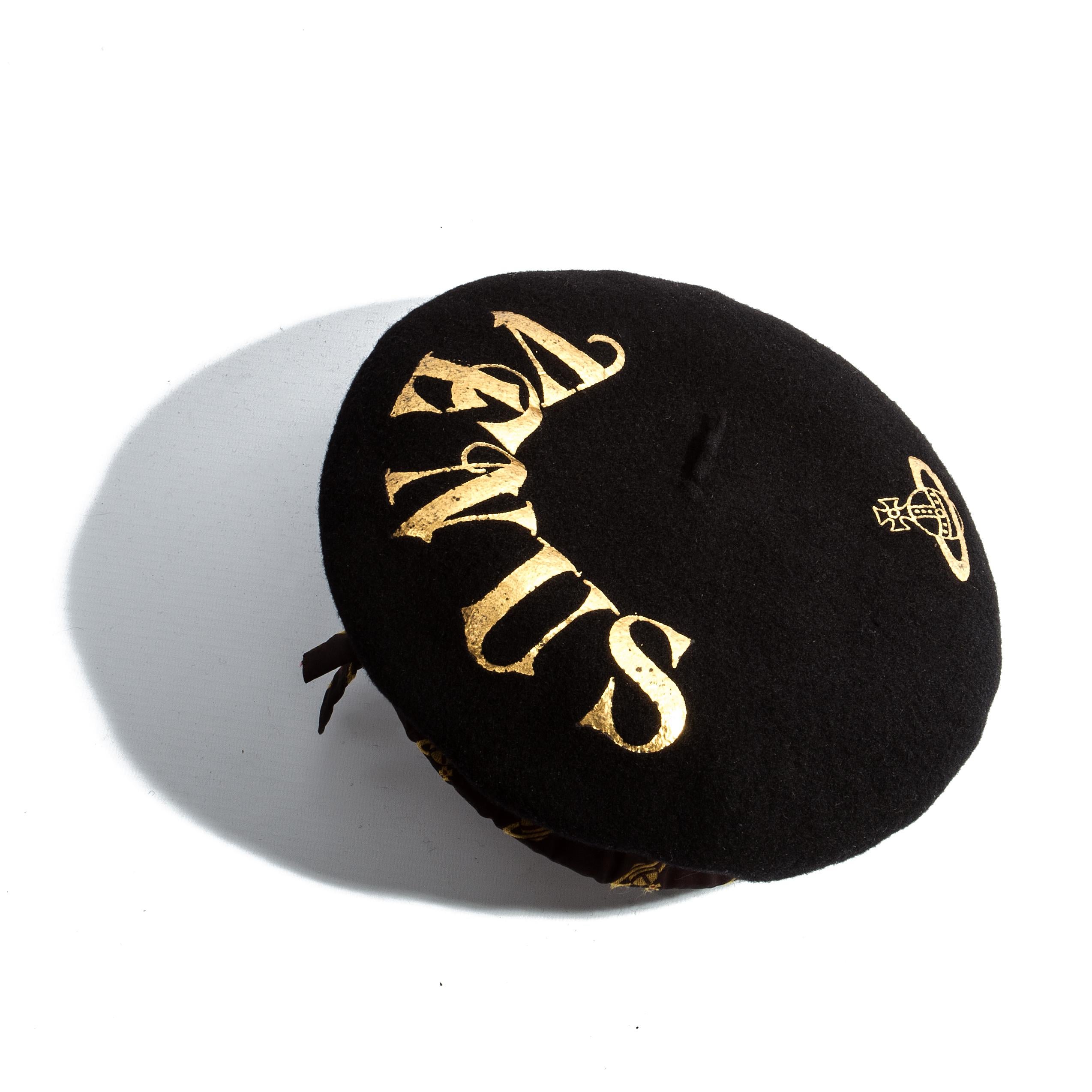 Rare Vivienne Westwood black wool beret with gold leaf 'Venus' and signature Orb logo. Made for the 'Choice' tour with Sara Stockbridge in 1988.

Pagan I, Spring-Summer 1988