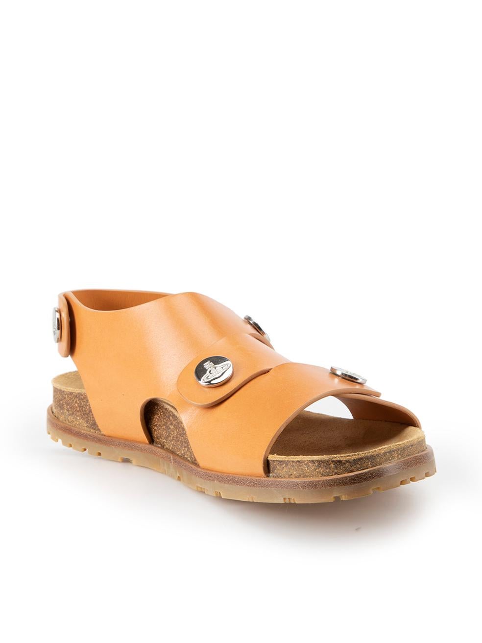 CONDITION is Very good. Minimal wear to sandals is evident. Minimal wear to exterior leather where scratches is visible on both shoes on this used Vivienne Westwood designer resale item. This item comes with original