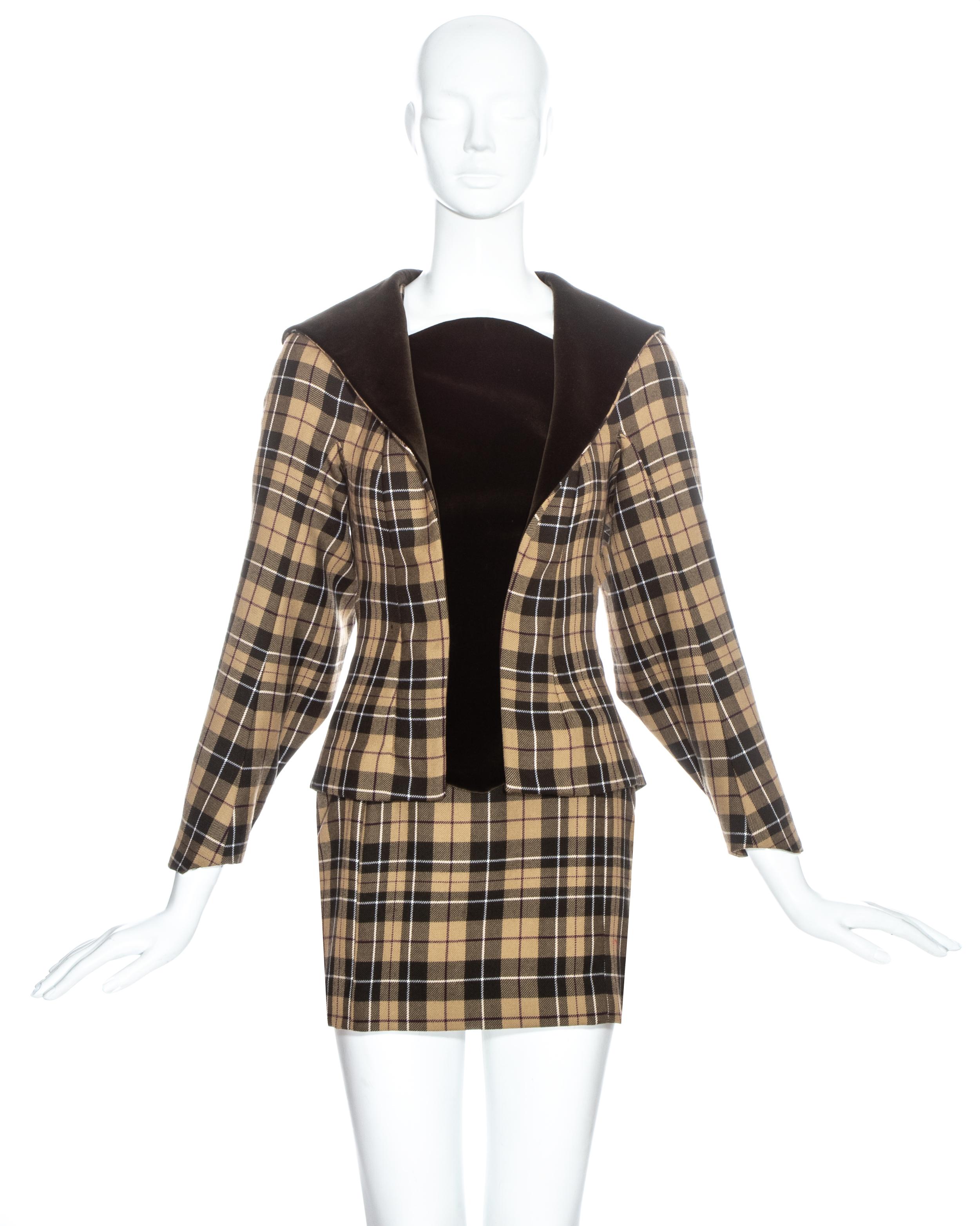 Vivienne Westwood brown tartan wool and velvet suit comprising: blazer jacket with leg of mutton sleeve, gold orb button fastenings at the back and velvet bodice, and matching mini skirt.

Fall-Winter 1997