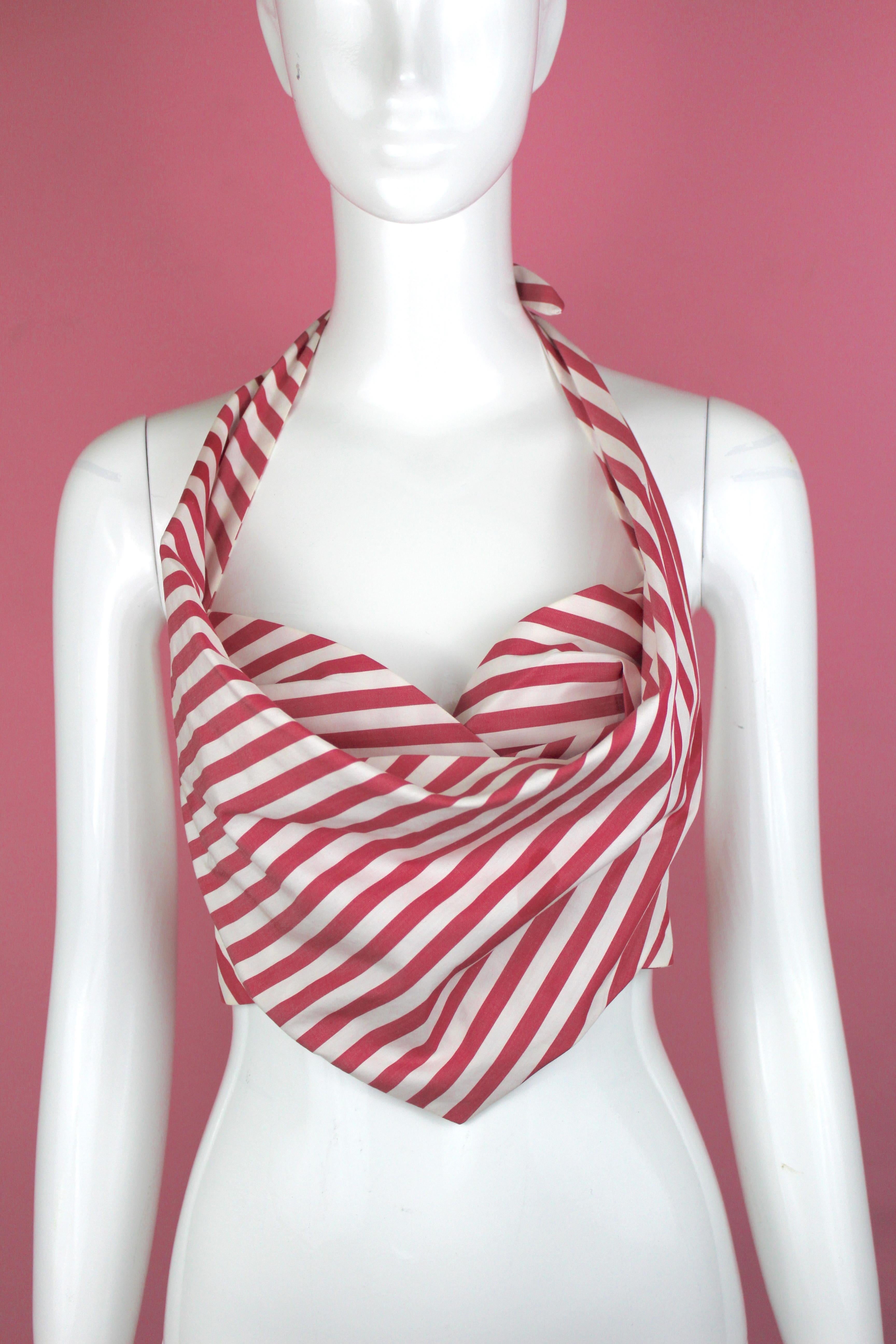 -Beautiful halter top from Vivienne Westwood
-In candy stripe pattern, ties on the neck, and fastens on the back
-Made in Italy 
-Sized 6 US on tag but best fitting size 4 US
-Care label has been cut off but 100% authentic 

Approximate Measurements