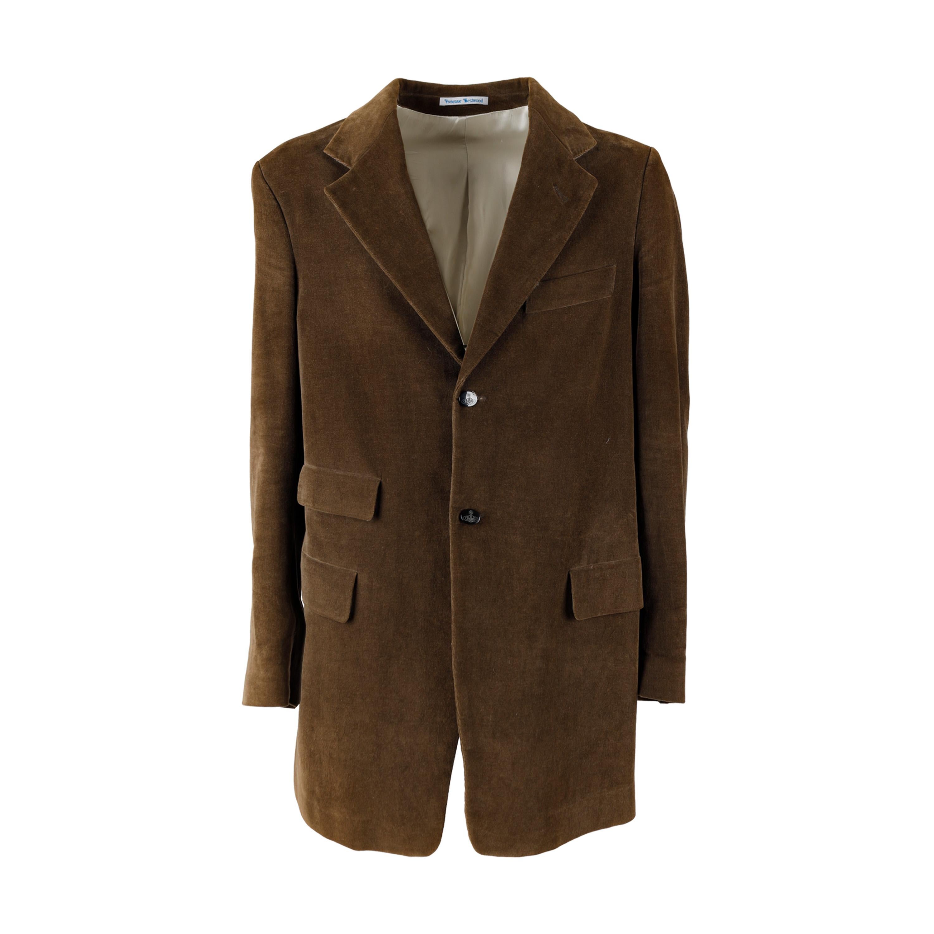 This Vivienne Westwood suit is crafted from a soft cotton corduroy fabric in a brown hue. Carefully designed details include a notched lapel, two-button closure, and 3 flap pockets, creating a classic look. The long jacket has a comfortable fit and