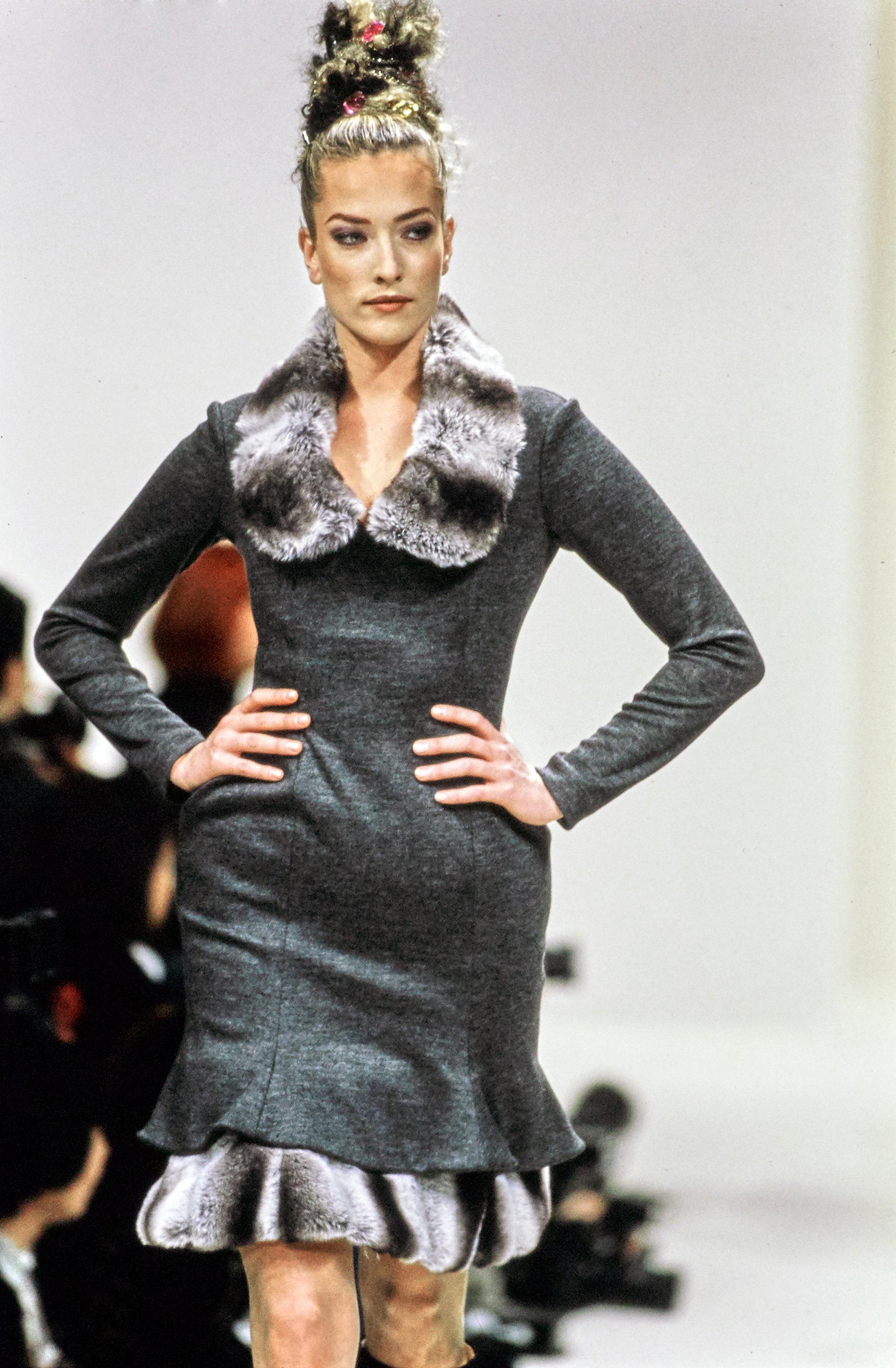 Vivienne Westwood grey wool mid-length dress with detachable faux fur collar and built-in corset

Fall-winter 1994
