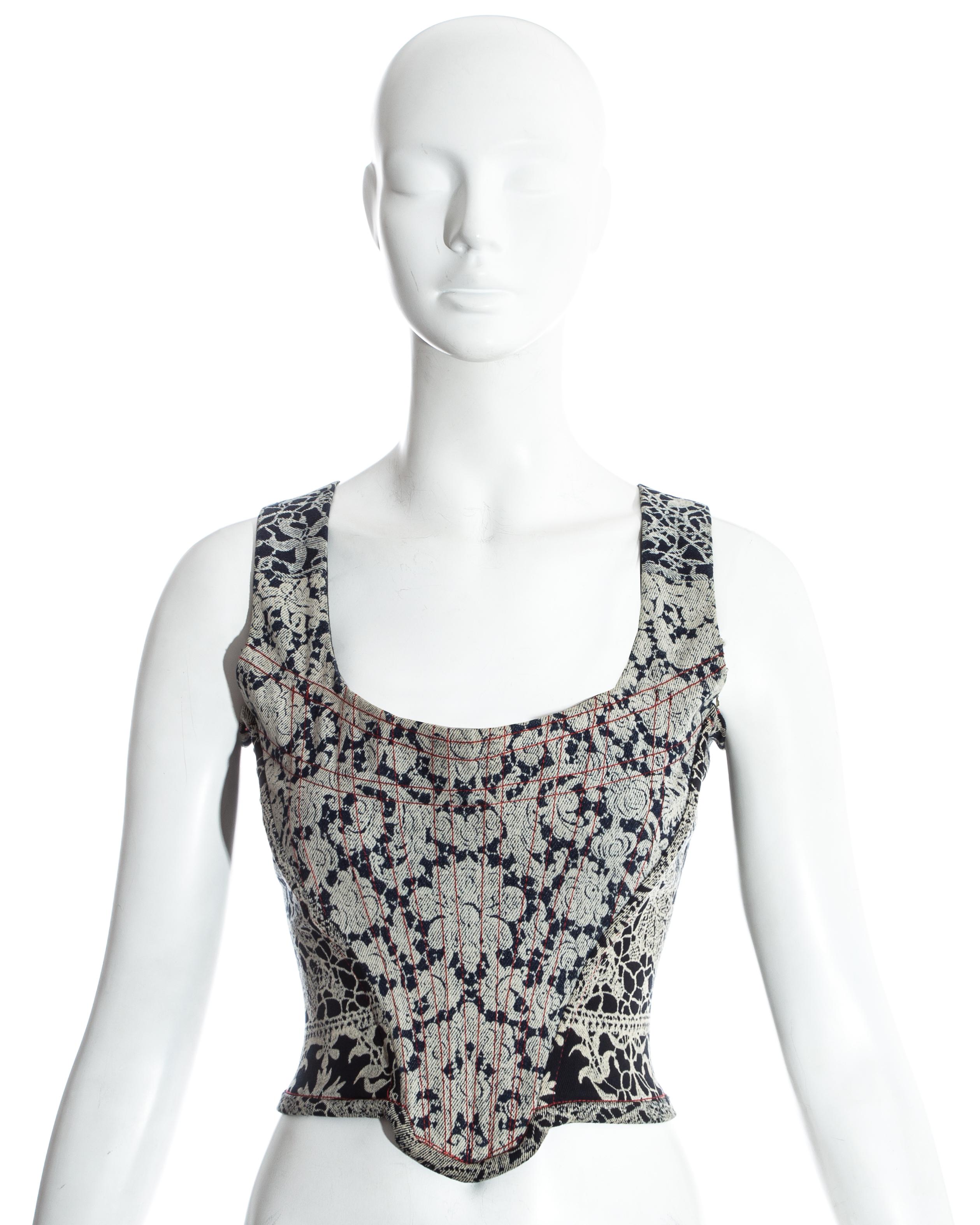 Vivienne Westwood denim lace print corset. Internal boning and zip fastening at centre back. 

'Always on Camera', Fall-Winter 1992