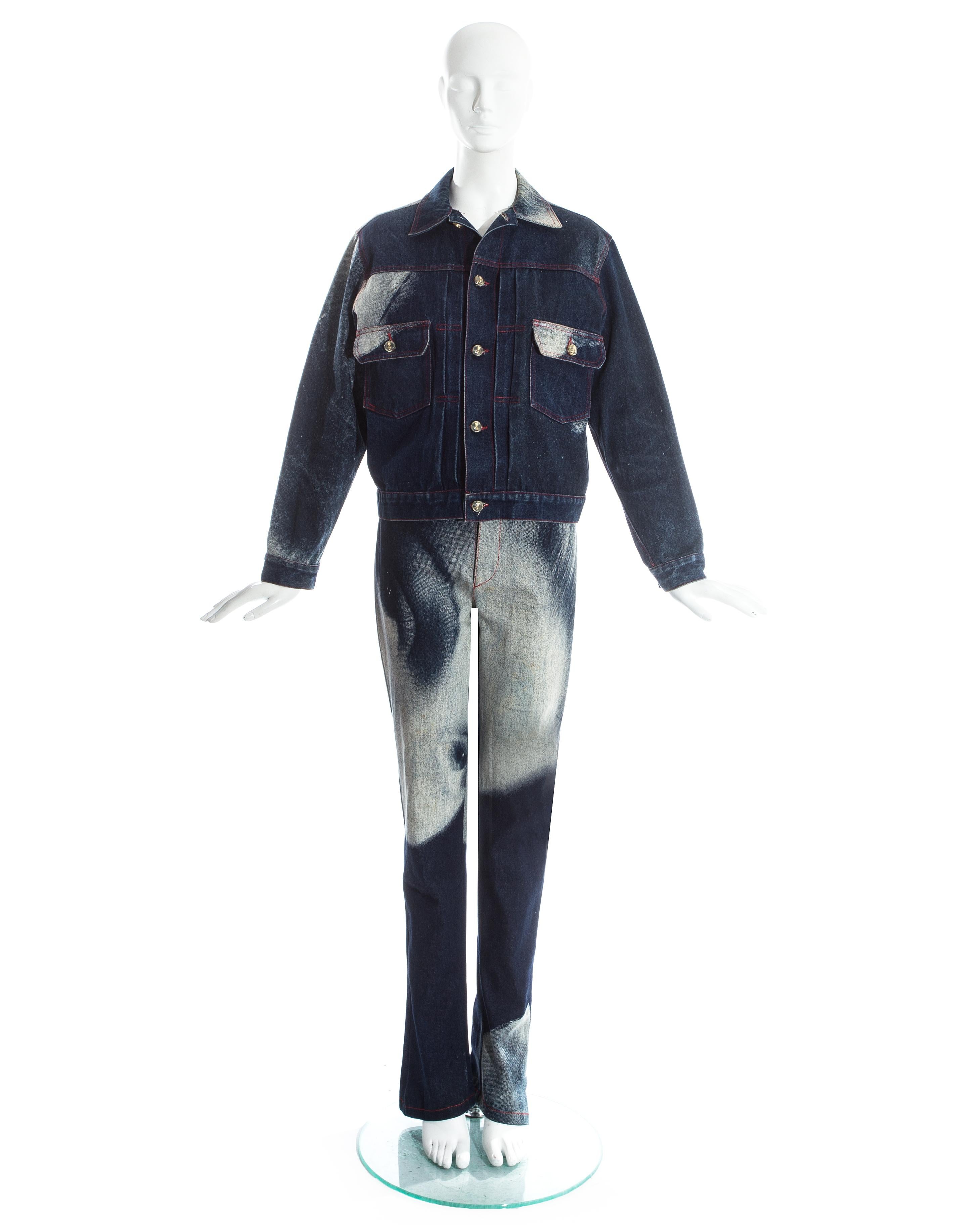 Vivienne Westwood denim pant suit printed with the iconic Marlene Dietrich print. Slim fit and high waisted jeans. Button up denim jacket. 

 'Always on Camera' pant suit, Fall-Winter 1992