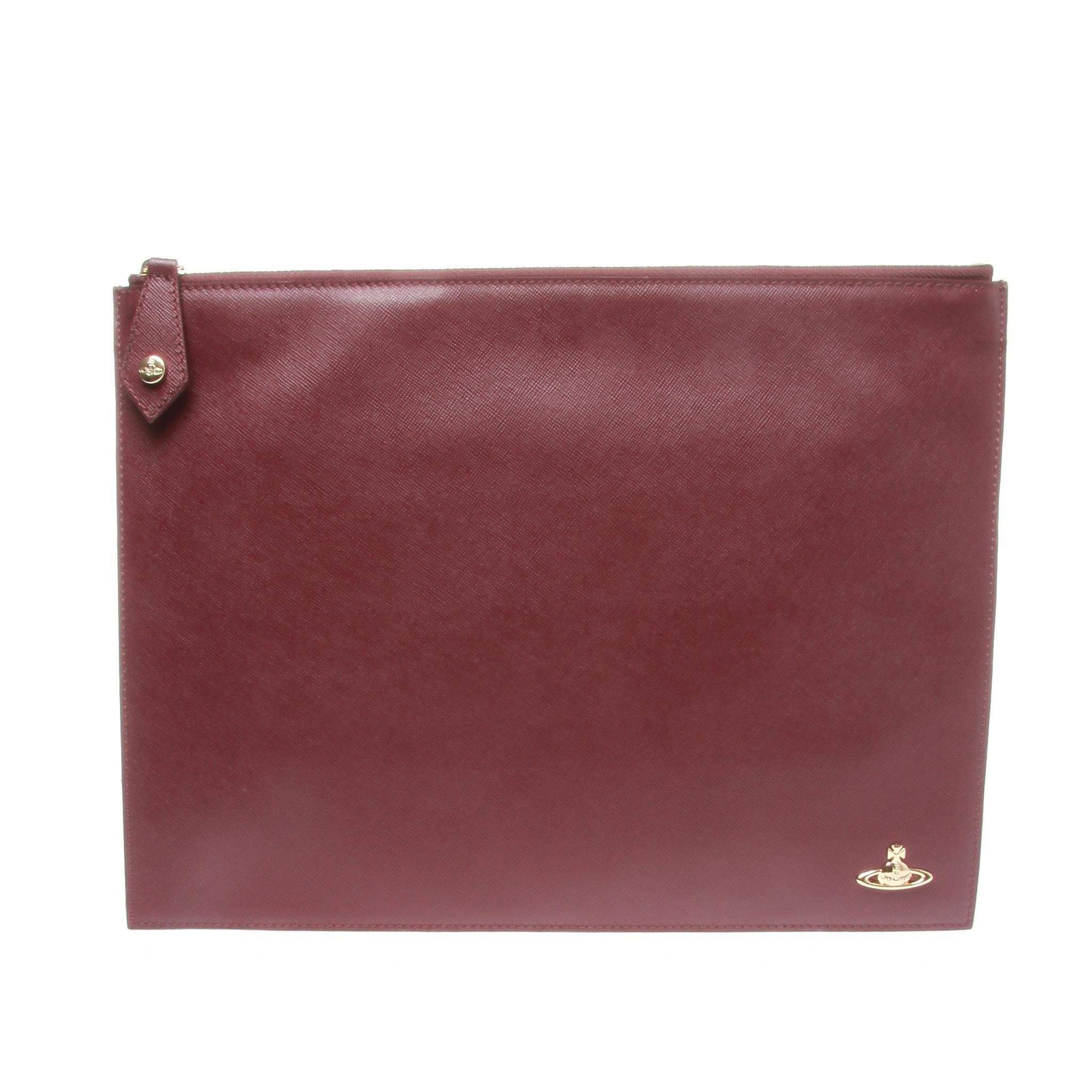A stunning Vivienne Westwood women's Saffiano clutch bag.

Wonderful bordeaux envelope clutch from iconic British designer, Vivienne Westwood.

Crafted from textured Saffiano leather, the clutch bag features a zip around closure that opens to reveal