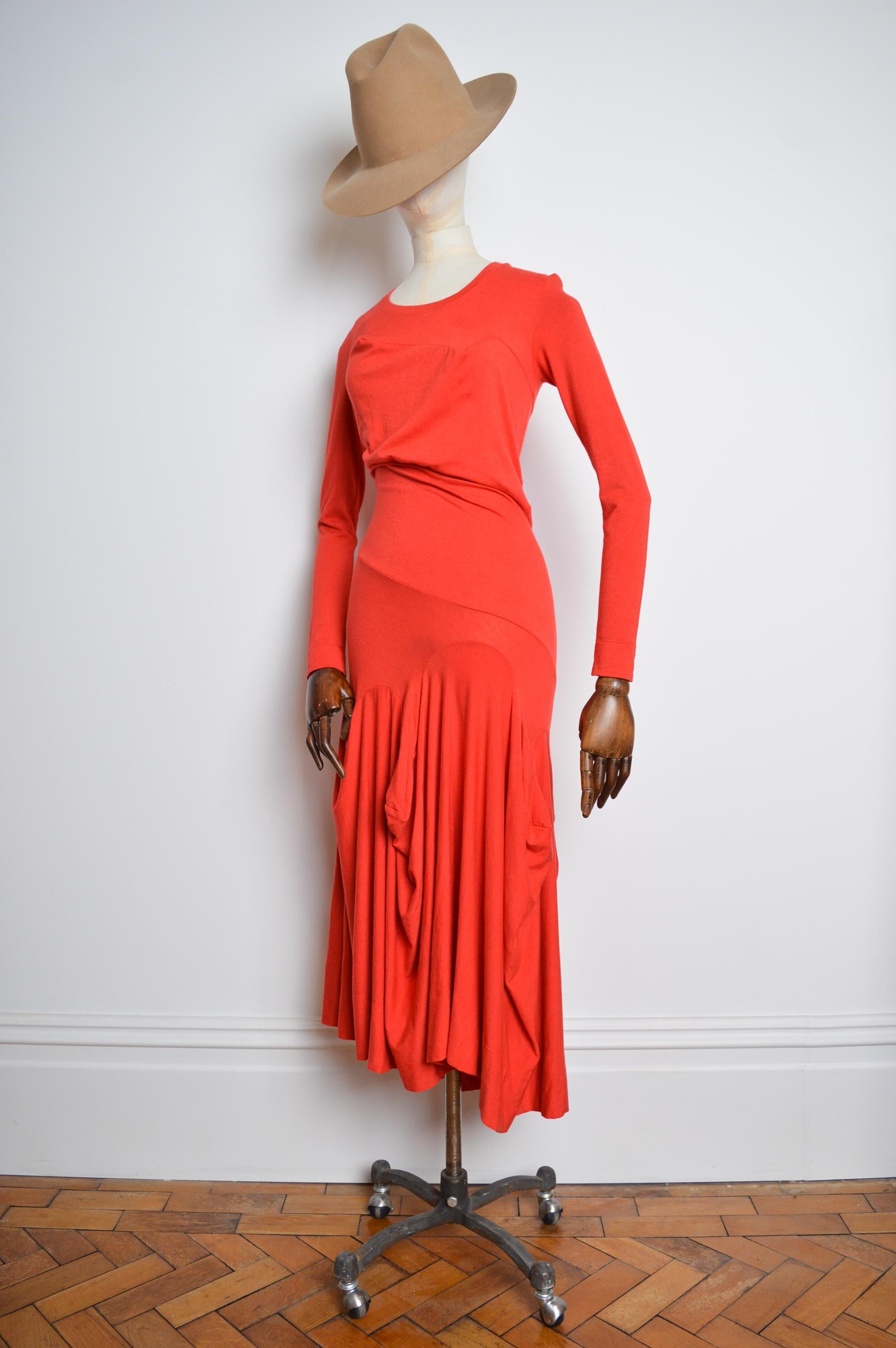Beautiful Vintage long sleeved avant guard maxi Dress from F/W 2008 by Vivienne Westwood (Look 35). 

This beautiful, long sleeved full length Dress is crafted from a mixture of wool and other elasticated fibres giving an almost jersey like material
