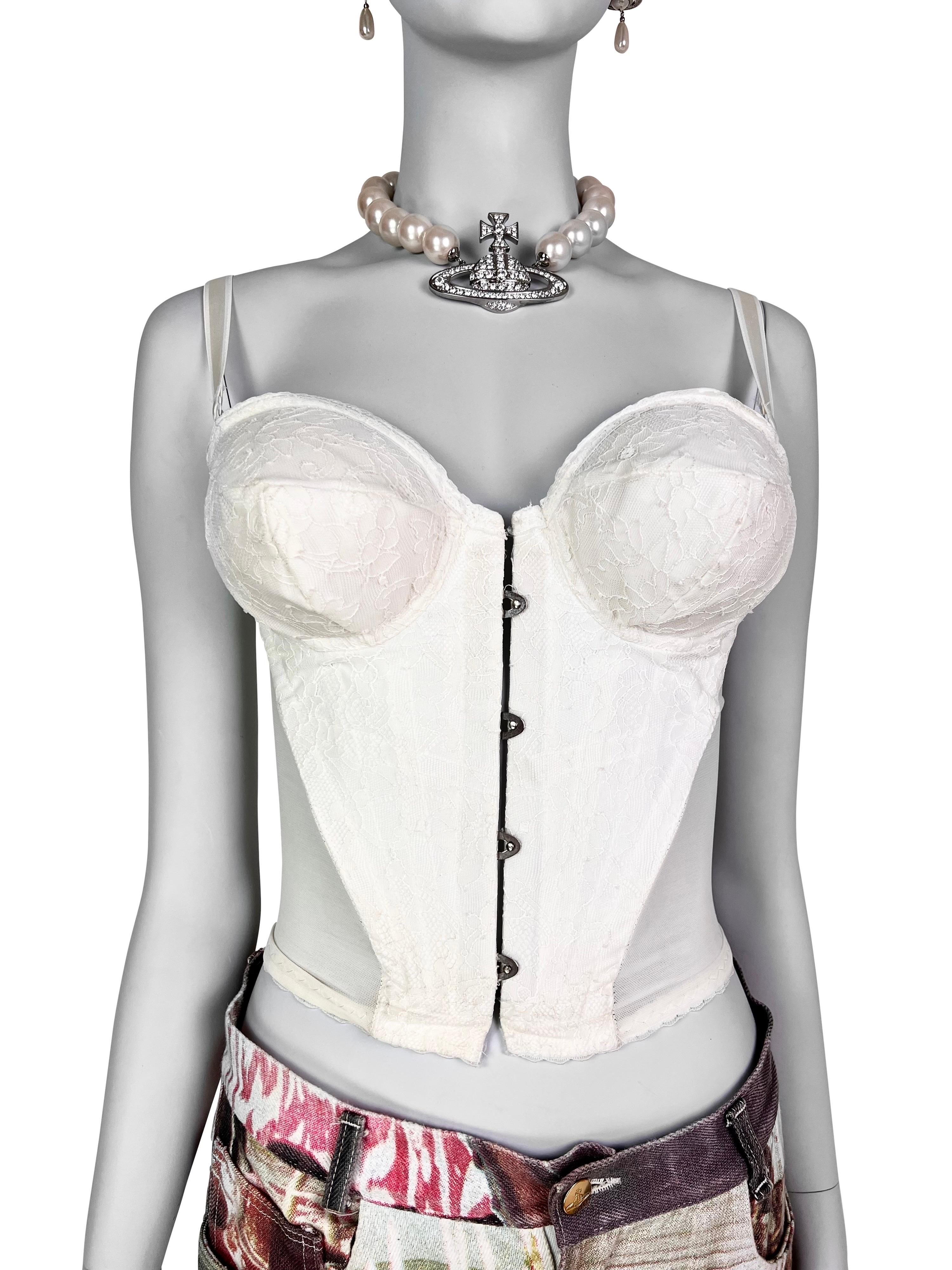 A key item of the iconic “Vive La Cocotte” collection by Vivienne Westwood, the epitome of extravagance, this stunning bustier/corset has a couple of pointy, bullet-bra-style padded cups, padding of which is easily removable (but why would you do