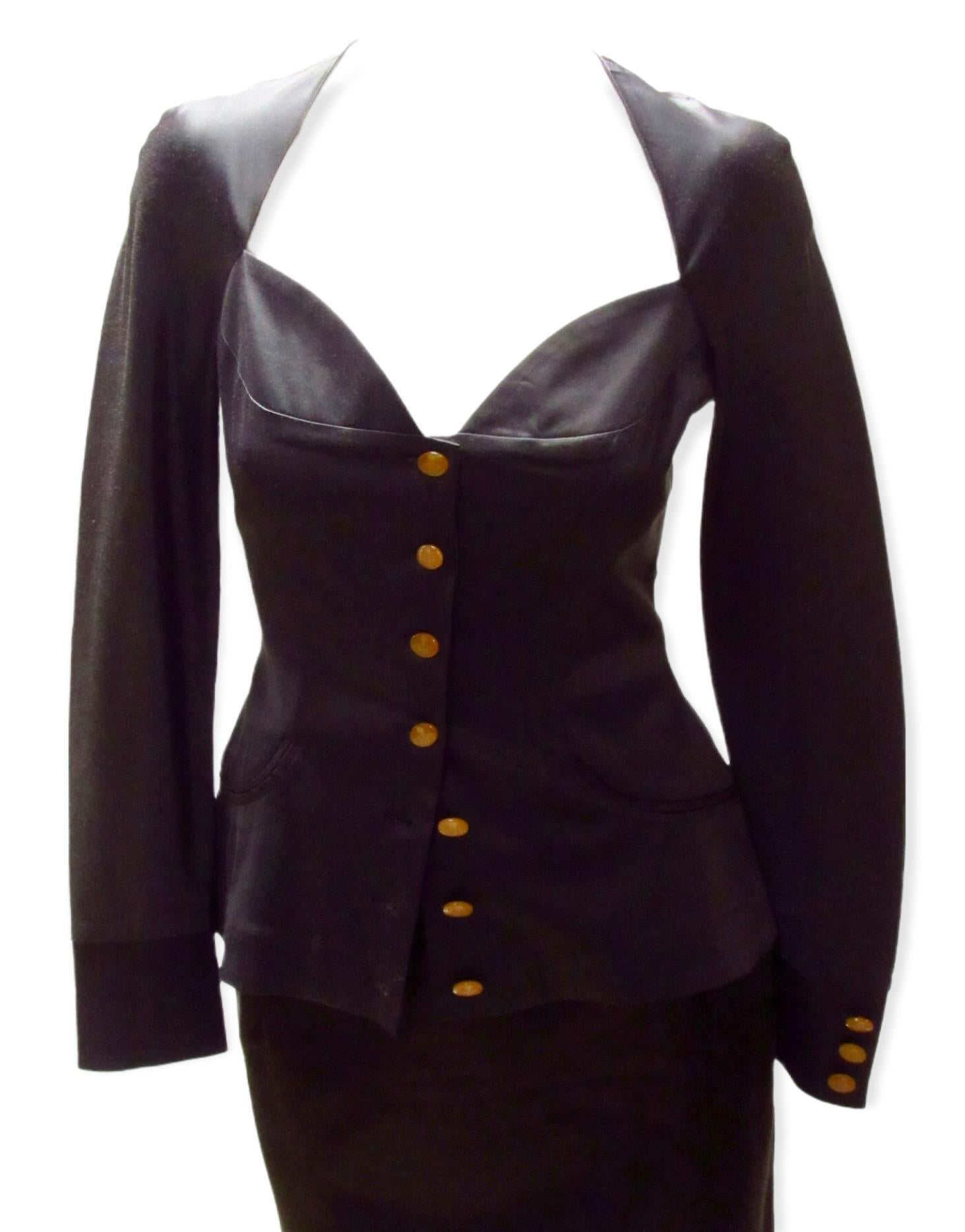 Beautifully tailored black jacket from vintage Vivienne Westwood. With a sweetheart neckline,  this ultra feminine satiny soft jacket fastens with signature logo buttons. Small front waistline pockets and buttoned cuffs.