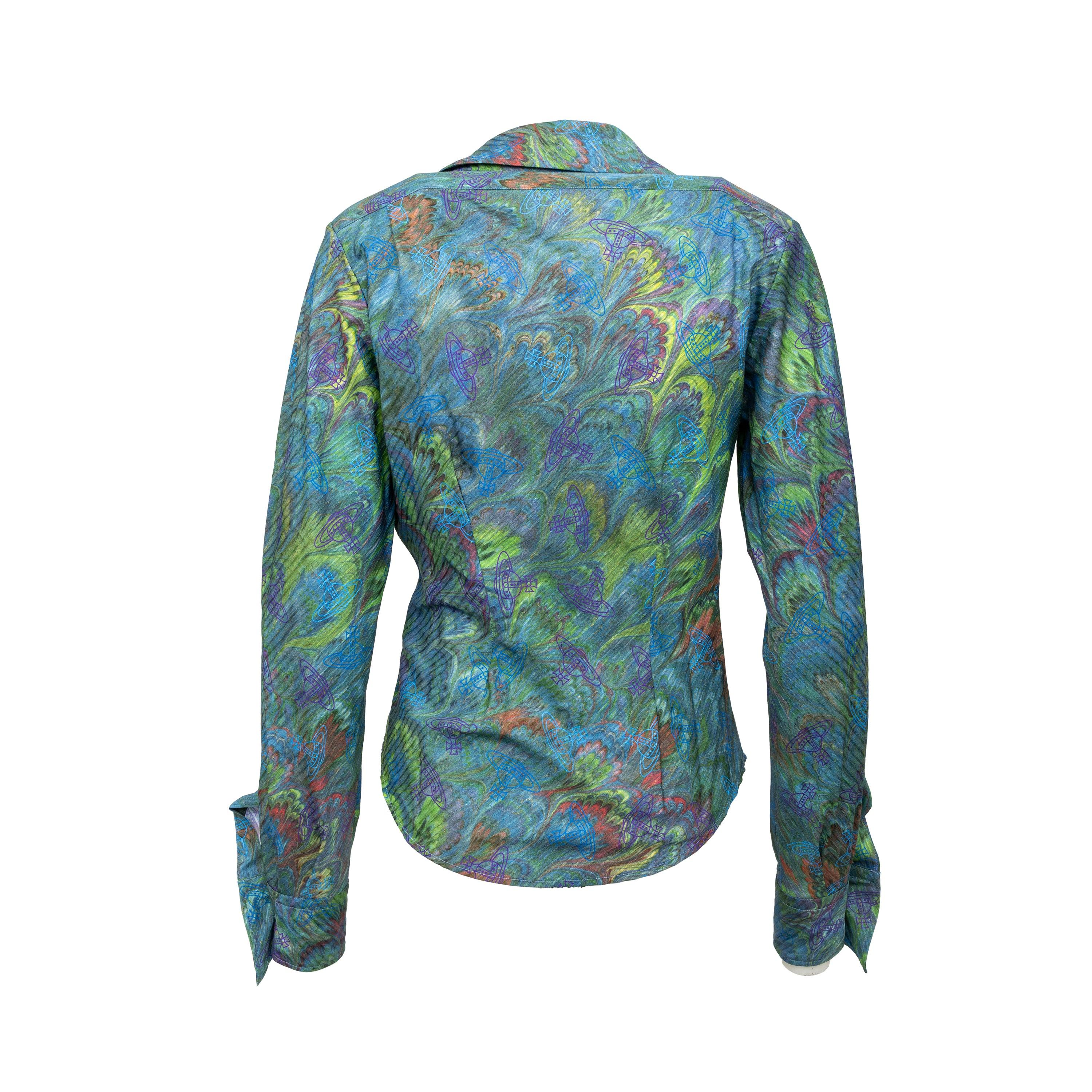 The Vivienne Westwood drunken shirt brings back the iconic 'Alcoholic' tailoring system from the Autumn-Winter 1983-84 'Witches' collection. Featuring an off-centre button placket and an asymmetrical hemline, this design showcases the unique