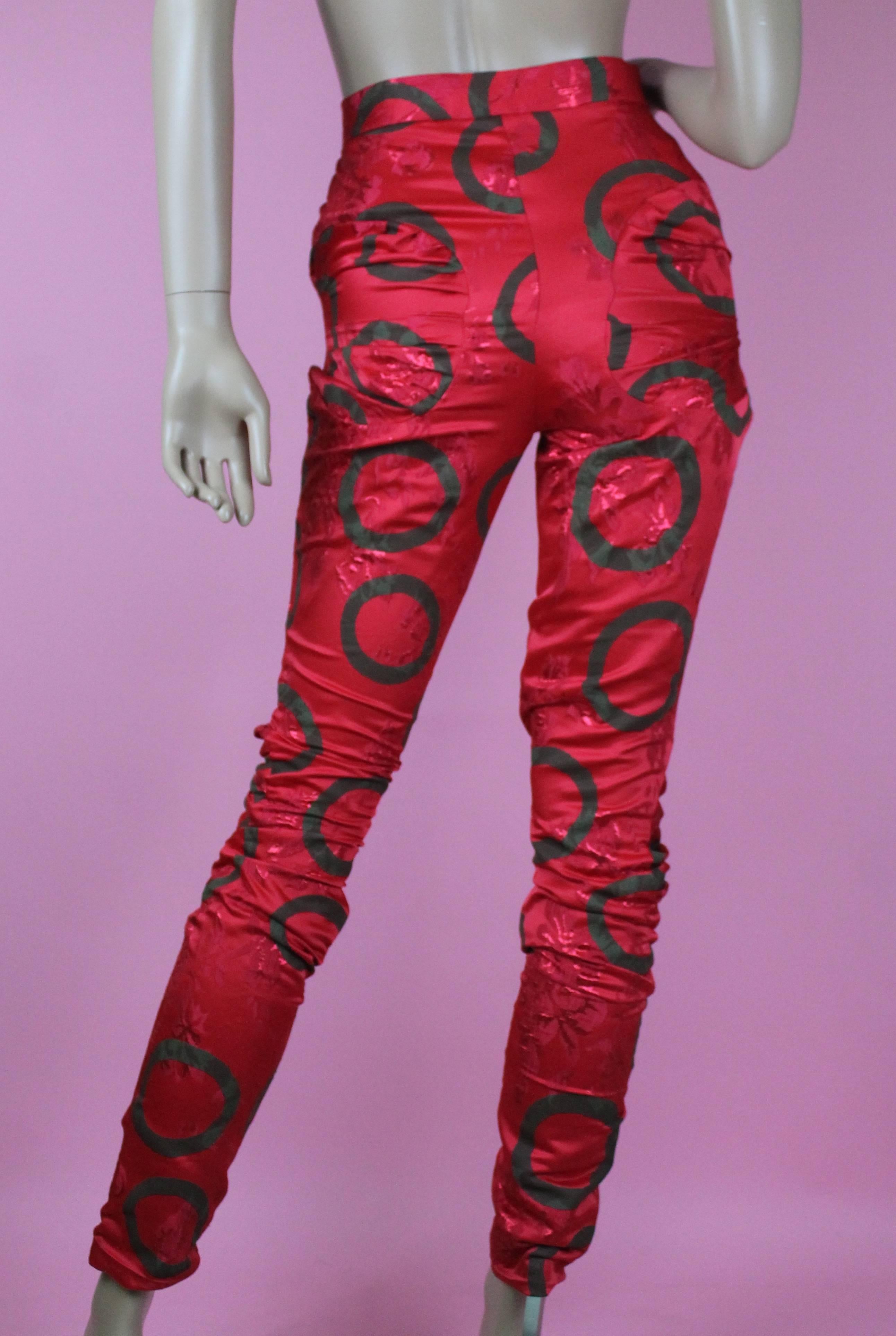 Vivienne Westwood Phoenix Trousers
-From the now defunct Gold Label division of the brand
-Seen on the runway for Autumn Winter 2013 during Paris Fashion Week
-Demi-couture trousers in red lurex fabric, this pair is new with tags 
-Has interesting