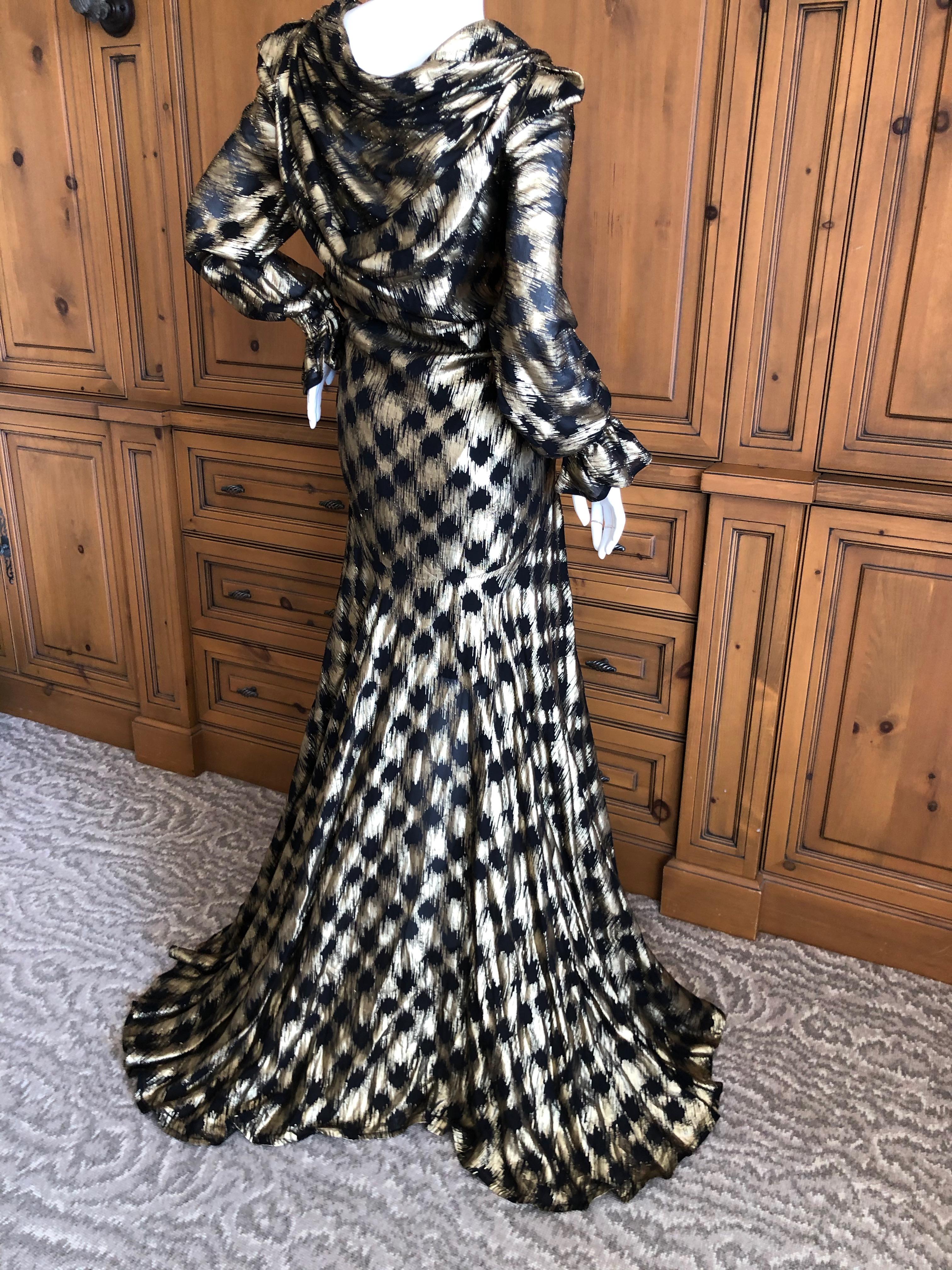 Vivienne Westwood 2015 Gold Label Evening Dress
Size 8 US , UK 12
 New with Tags 
This is such a charming piece, the gold is much more pronounced than in the photos.
Bust  38