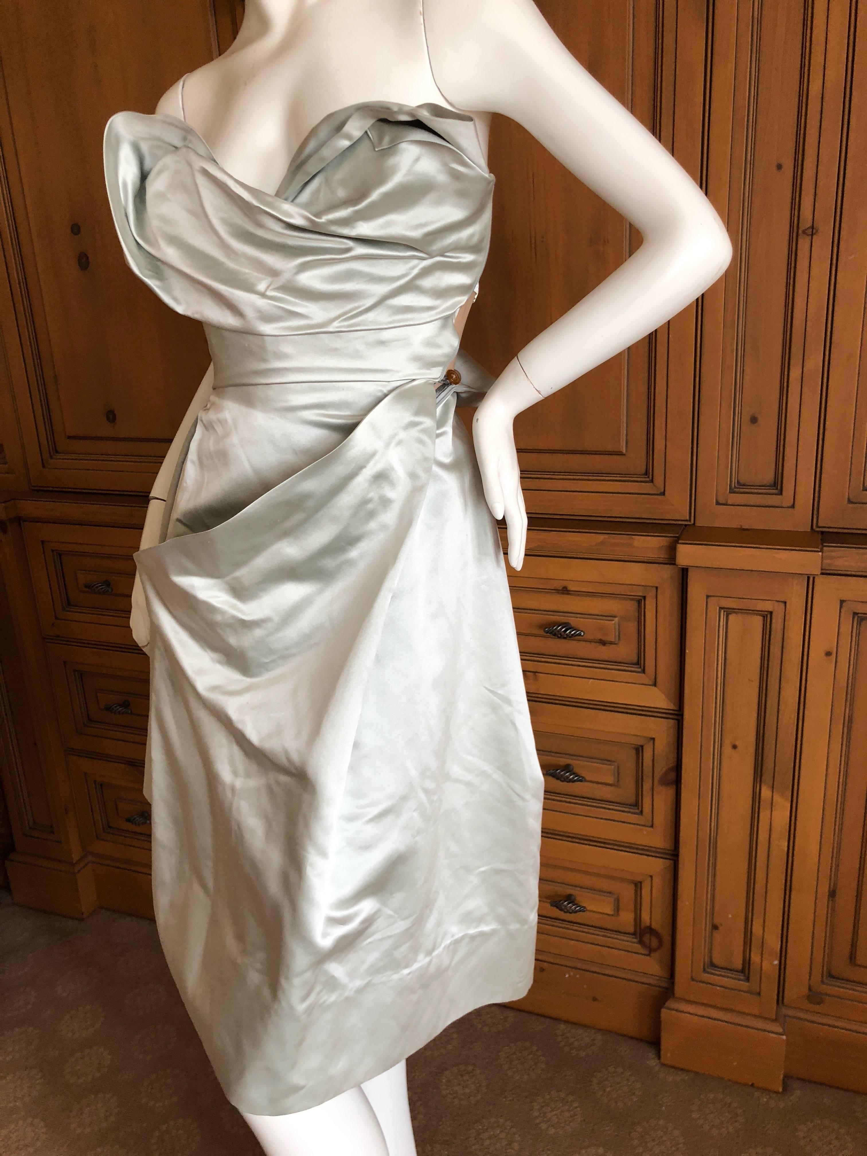 Vivienne Westwood Gold Label strapless silvery blue Cocette dress.

Full inner corset, and diagonal zipper across the front, this is a tailoring work of art,

This is such a charming piece.

UK size 10

Bust  34