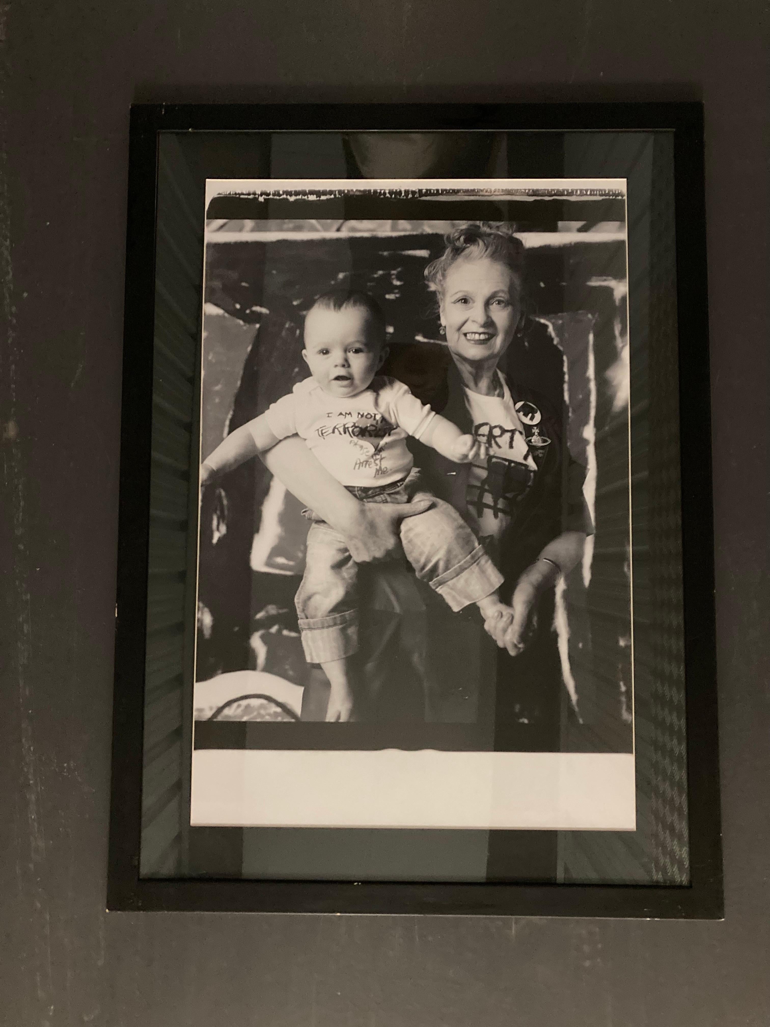 An original one-off large format Polaroid photograph of Vivienne Westwood and child for the Vivienne Westwood Active Resistance limited edition book produced by Opus. By photographer Zenon Texeira.

Large-format polaroids are extremely rare and