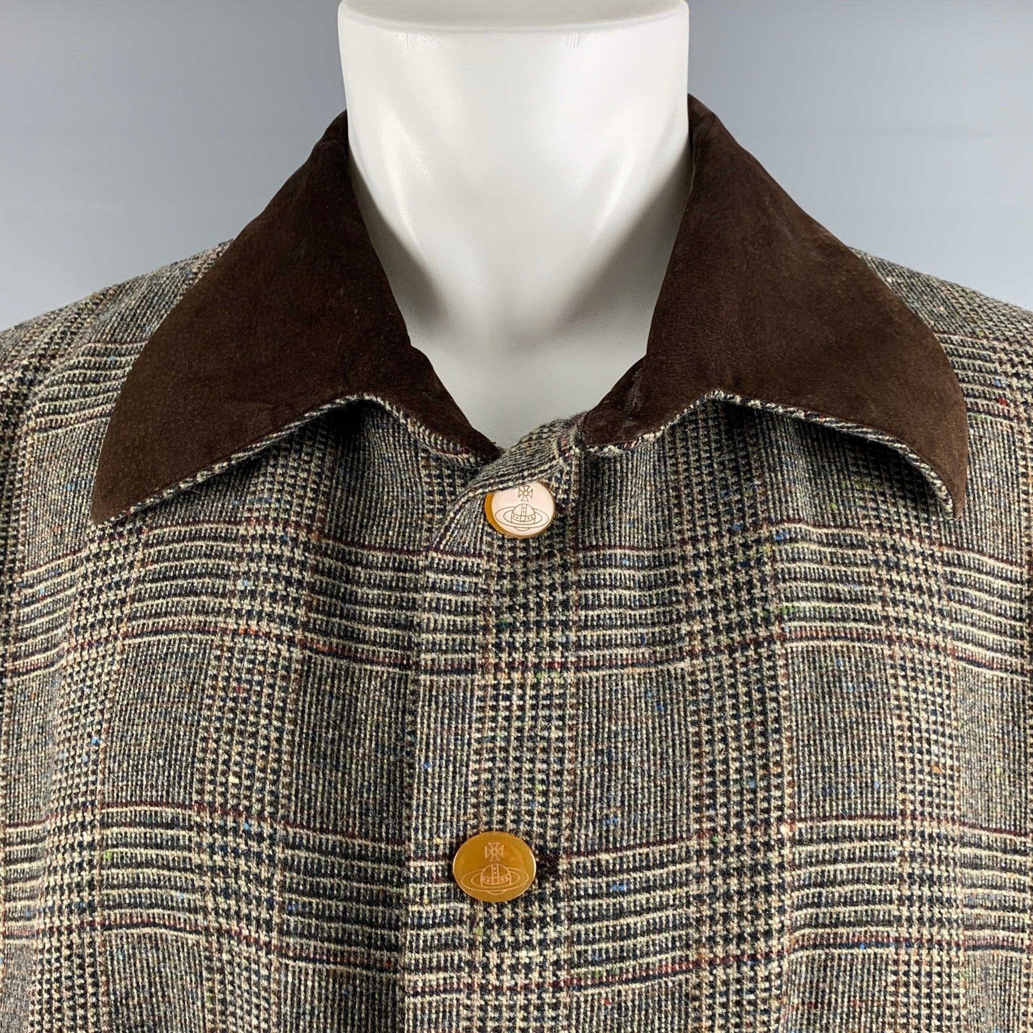 VIVIENNE WESTWOOD MAN coat comes in grey and black plaid lambs wool woven material featuring a vintage car coat style, drop shoulder, patch pockets, collar and hem suede details, and logo buttons closure. Made in Italy.Very Good Pre-Owned Condition.