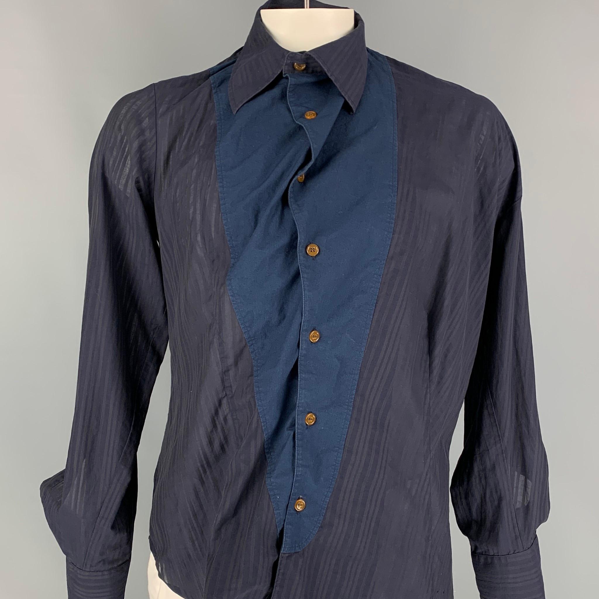 VIVIENNE WESTWOOD MAN long sleeve shirt comes in a navy & blue cotton featuring an asymmetrical style, spread collar, and a ruched buttoned closure. Made in Italy. 

Very Good Pre-Owned Condition.
Marked: III

Measurements:

Shoulder: 20 in.
Chest: