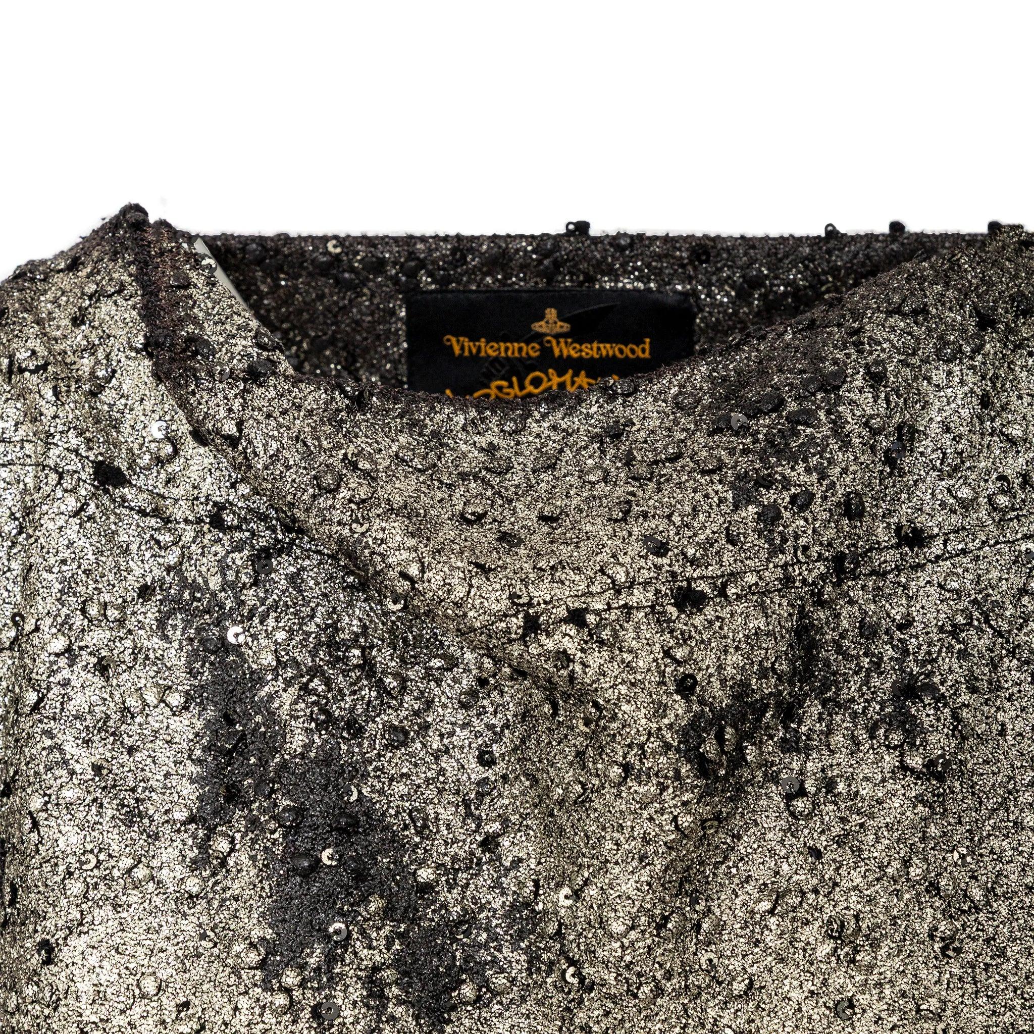 Vivienne Westwood metallic dress with textured accents, asymmetric boat neckline, and a short loose-fit silhouette. Versatile as a mini dress or chic long top.
 Remarks: there are some fading on the fabric.  
 Measurements: