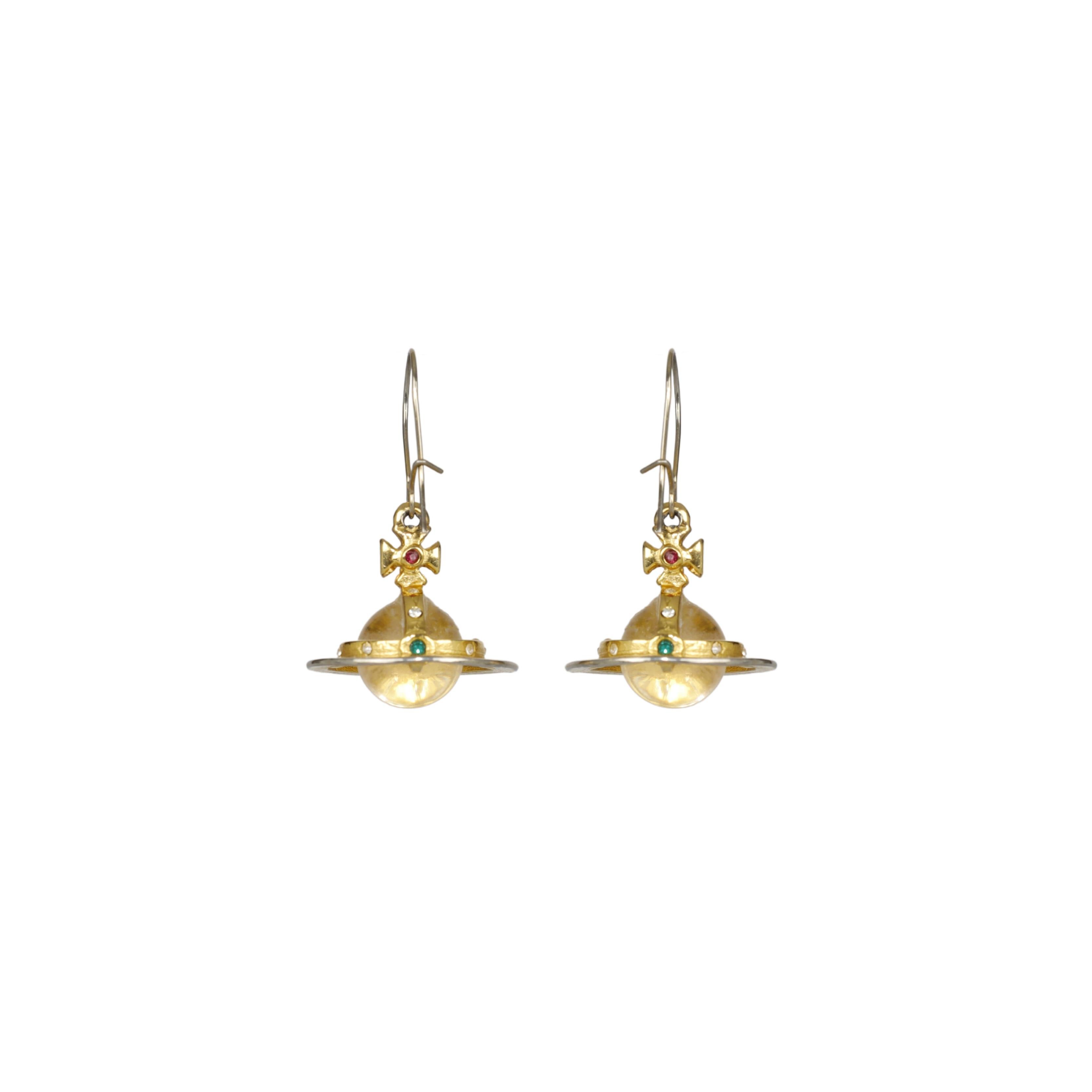 These Vivienne Westwood Orb Earrings feature a stunning transparent crystal-like orb, a signature of the brand, complemented by small multicolor gemstones adorning the gold-tone frame. The result is a dainty but eye-catching pair of earrings,