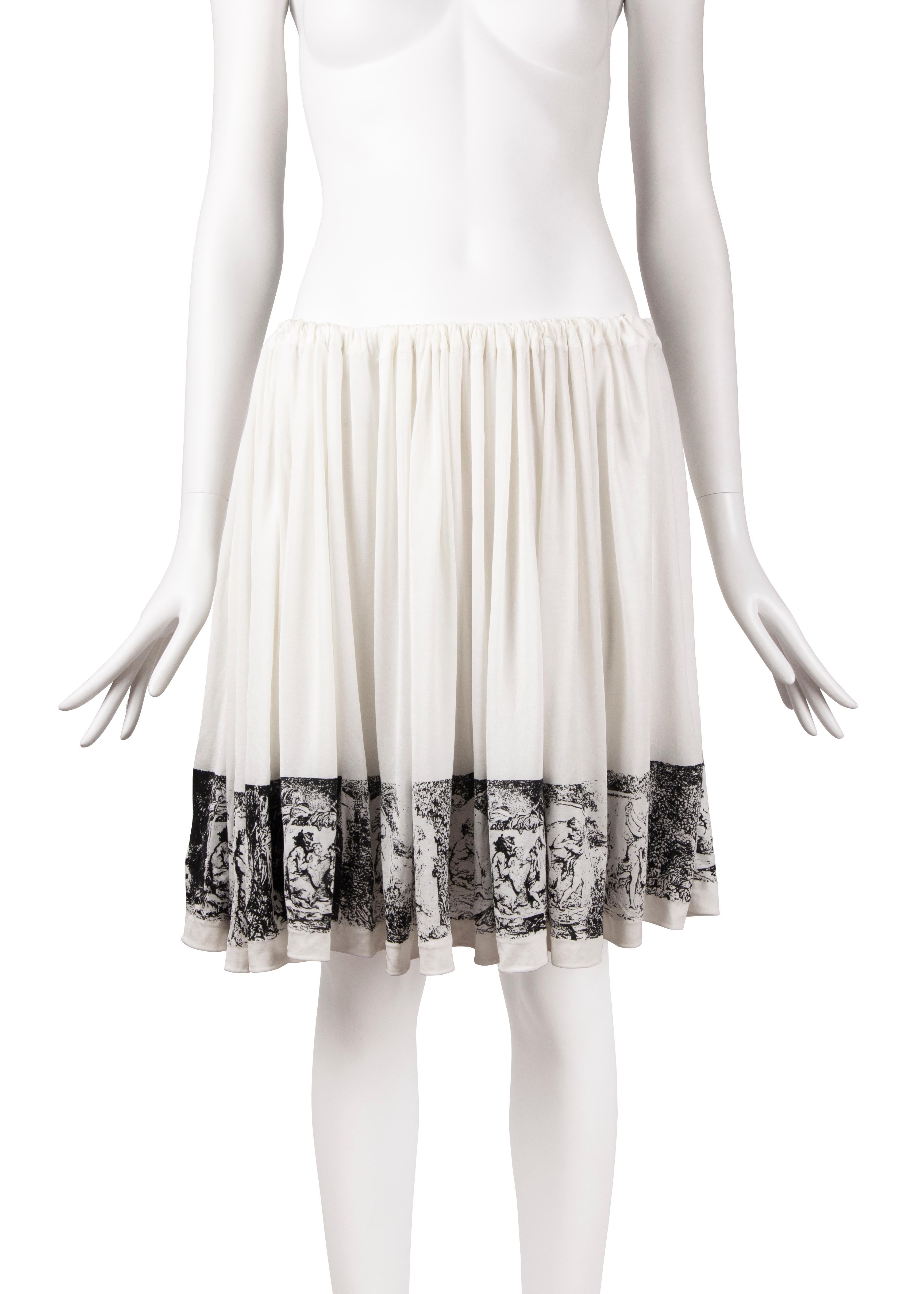 A Vivienne Westwood ‘’Pagan” bustle skirt, Spring-Summer 1988. Made from a slinky off-white acetate fabric, this skirt features a draw- string waist that creates natural pleats, adding to its fluid silhouette. The garment is versatile with circular