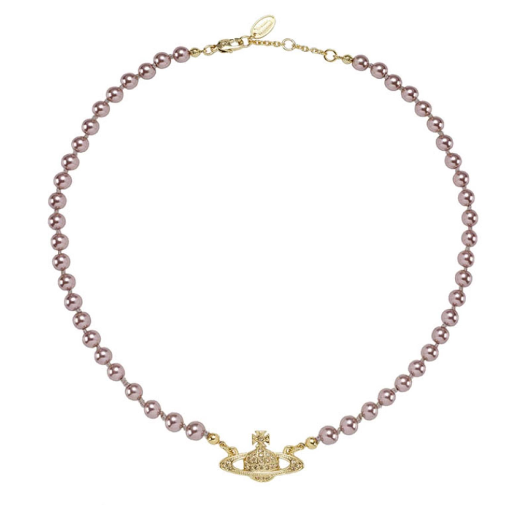 Vivienne Westwood Bas Relief Pearl choker gold/light topaz. With a string of pastel faux pearls. The Orb has light Colorado Topaz Swarovski crystals and an adjustable choker, with three fine links allowing the length to be altered.

COLOR: Rose