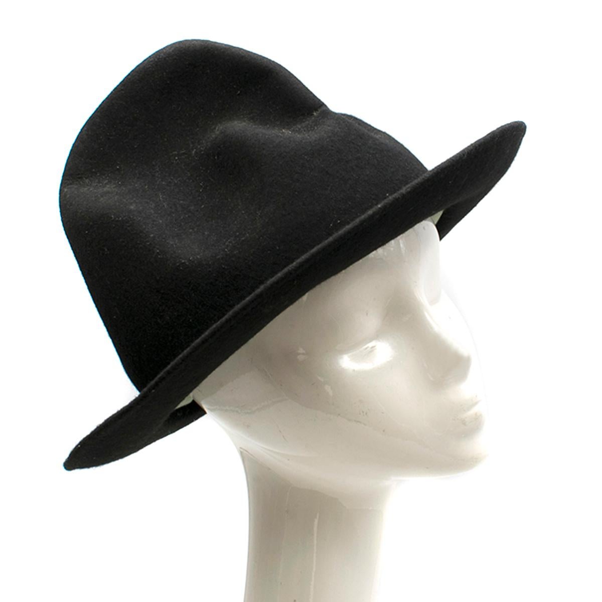 Vivienne Westwood Mountain hat

- Black, felt 
- Asymmetric moulded crown 
- Structured brim 
- Padded brow band 
- Unlined 

Please note, these items are pre-owned and may show some signs of storage, even when unworn and unused. This is reflected