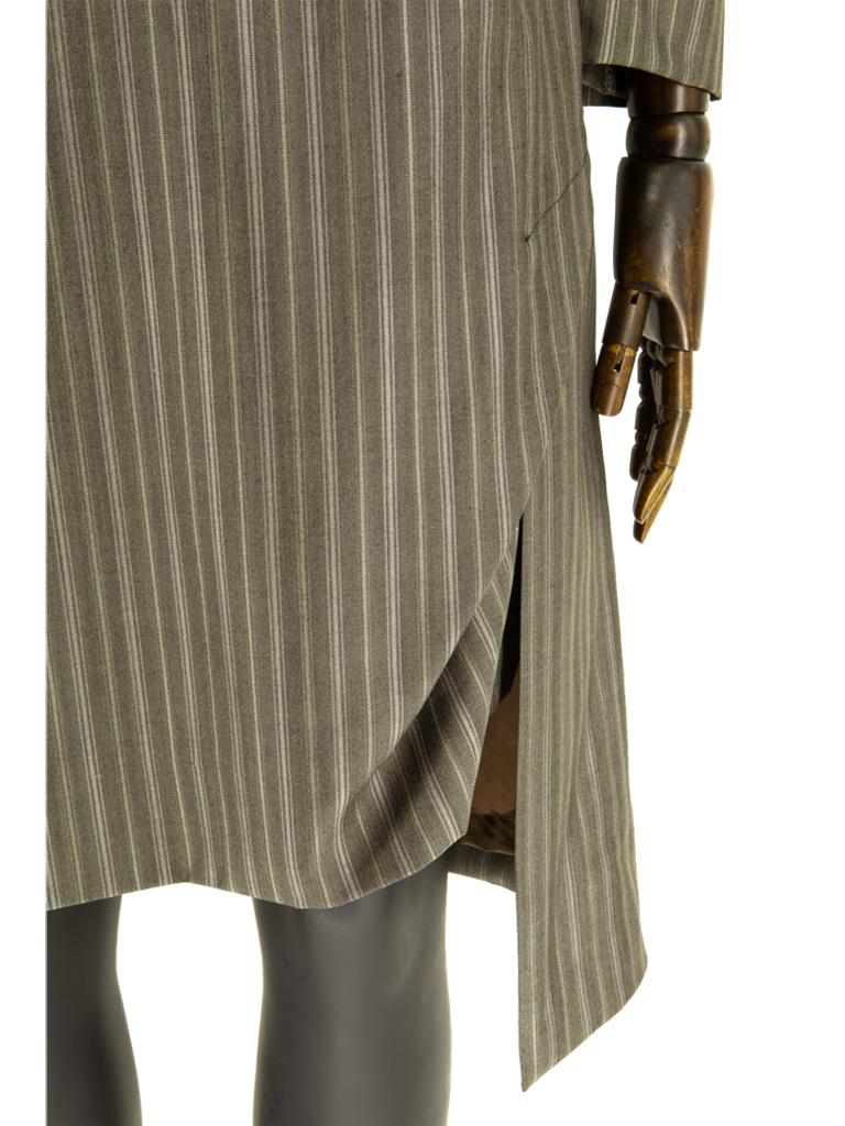 A circa 2010 Vivienne Westwood fine wool and silk striped suit of alternating diagonal and miniature herringbone weave, in taupe- and silver-grey, the sculptured fitted jacket with a V-neckline, soft folds and drapes, deep set-in sleeves with