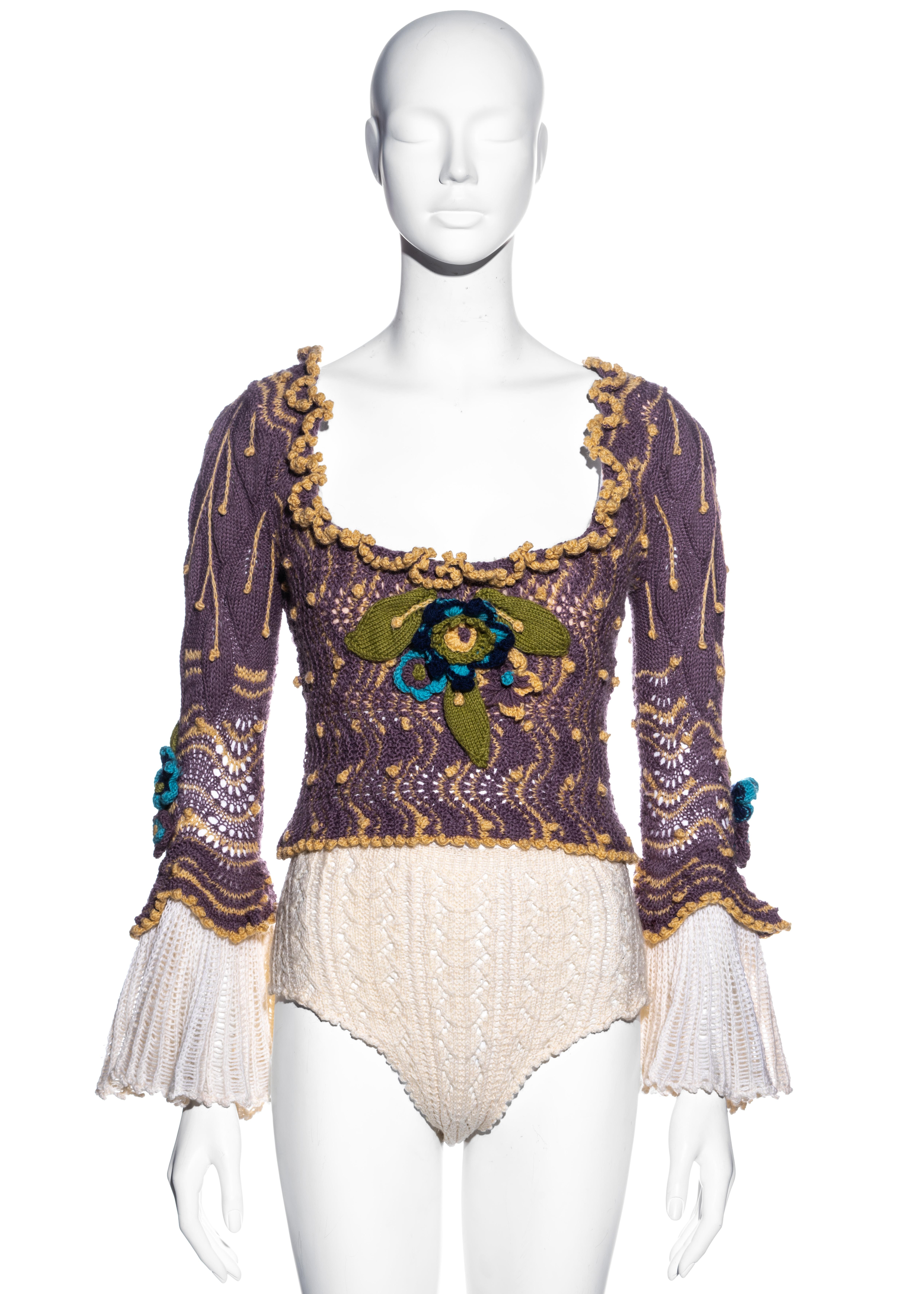 ▪ Vivienne Westwood purple crochet knit corset and panties set
▪ Built-in corset
▪ Knitted floral appliques 
▪ Fluted sleeves 
▪ Matching high waisted panties 
▪ Size Medium
▪ Fall-Winter 1994
