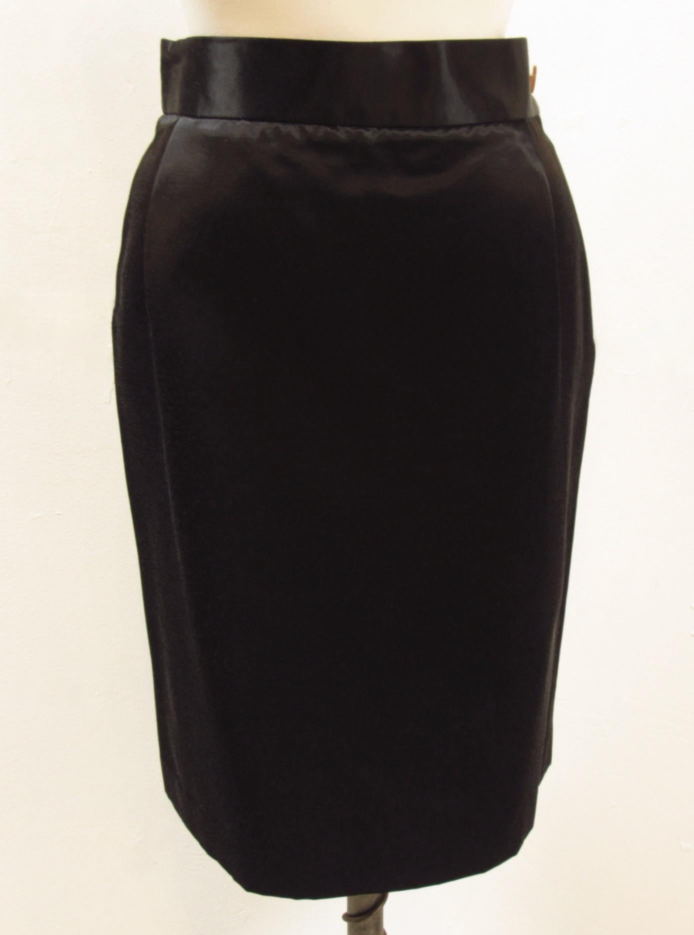 Gorgeous black satiny pencil skirt from vintage Red Label Vivienne Westwood has a side zip and signature logo button. Ample back slit.