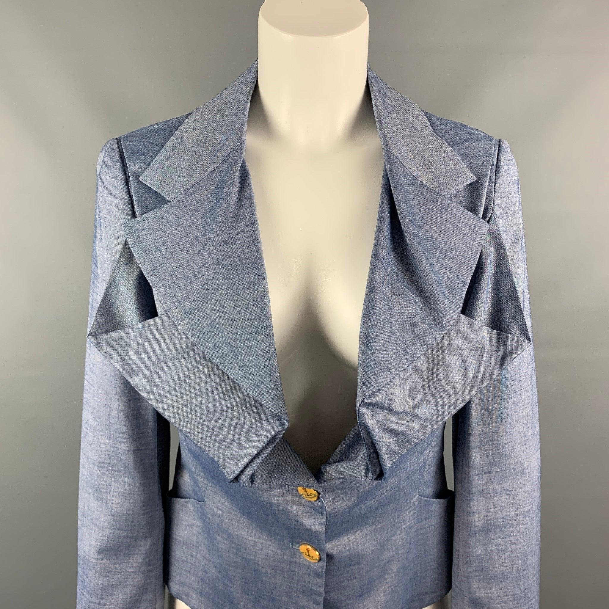 VIVIENNE WESTWOOD RED LABEL jacket comes in a blue wool blend with a full monogram print liner featuring a large ruffled collar, slit pockets, and a double buttoned closure. Very Good Pre-Owned Condition. 

Marked:   42 

Measurements: 
 
Shoulder: