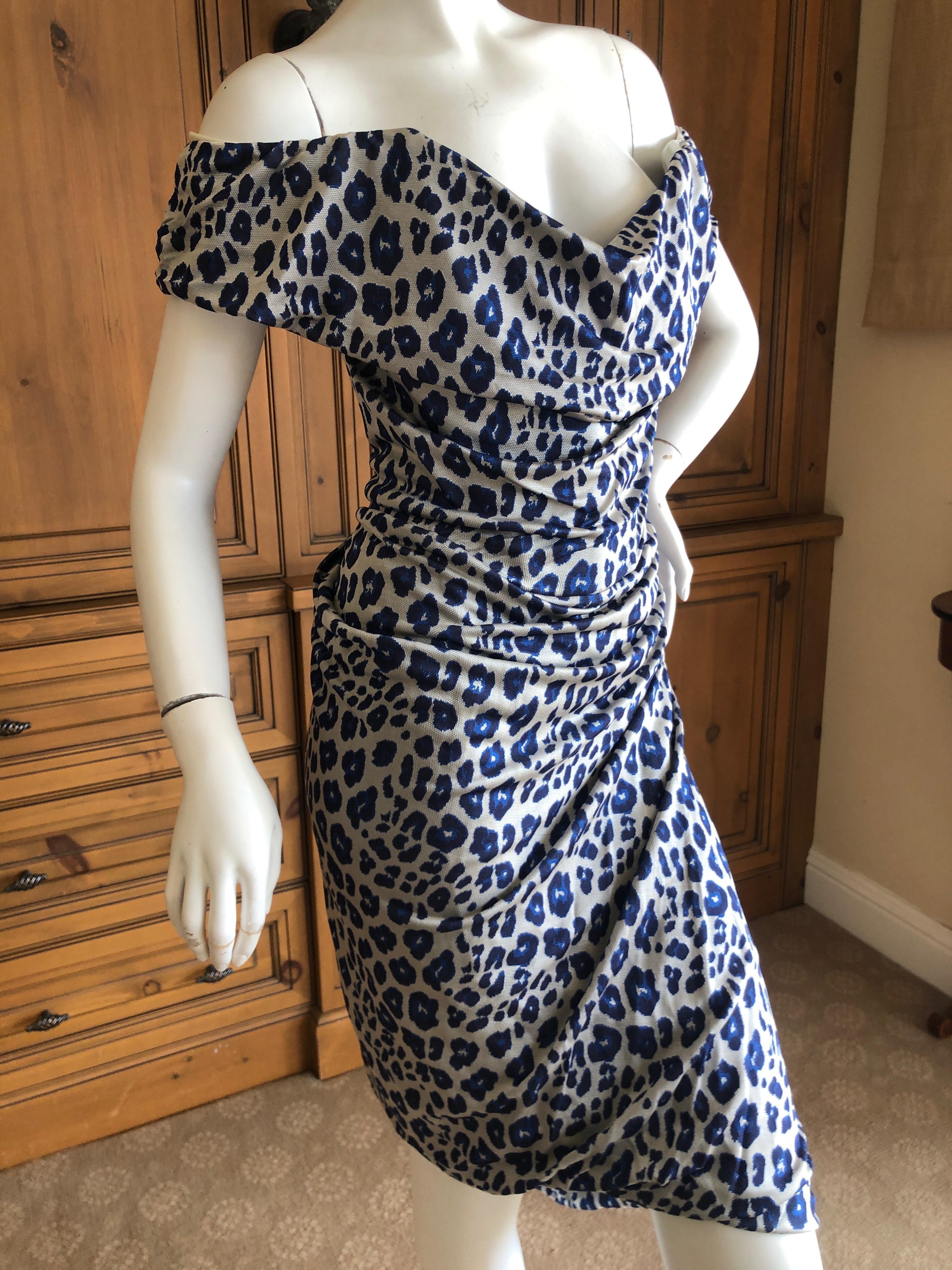 Super sexy draped leopard print dress from Vivienne Westwood Red Label.
There is a full inner corset, see photo's .
There is a lot of stretch in this fabric.
Size M
Bust 36