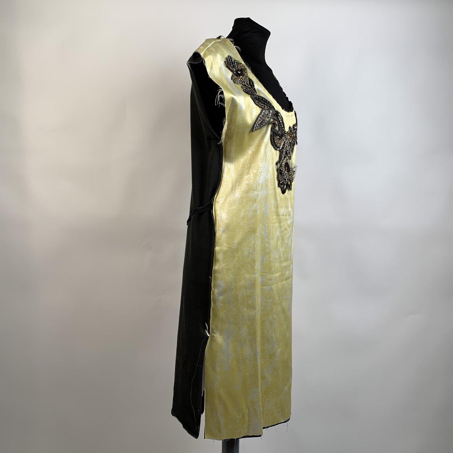 Description - Vivienne Westwood Red Label Yellow Spring 2016 Dress Size 40 - Sleeveless design - Beaded applique embellishment on the front - Raw cut along the edges of the dress - Round neckline - Self-tie straps at the waist - Main Fabric: 95%