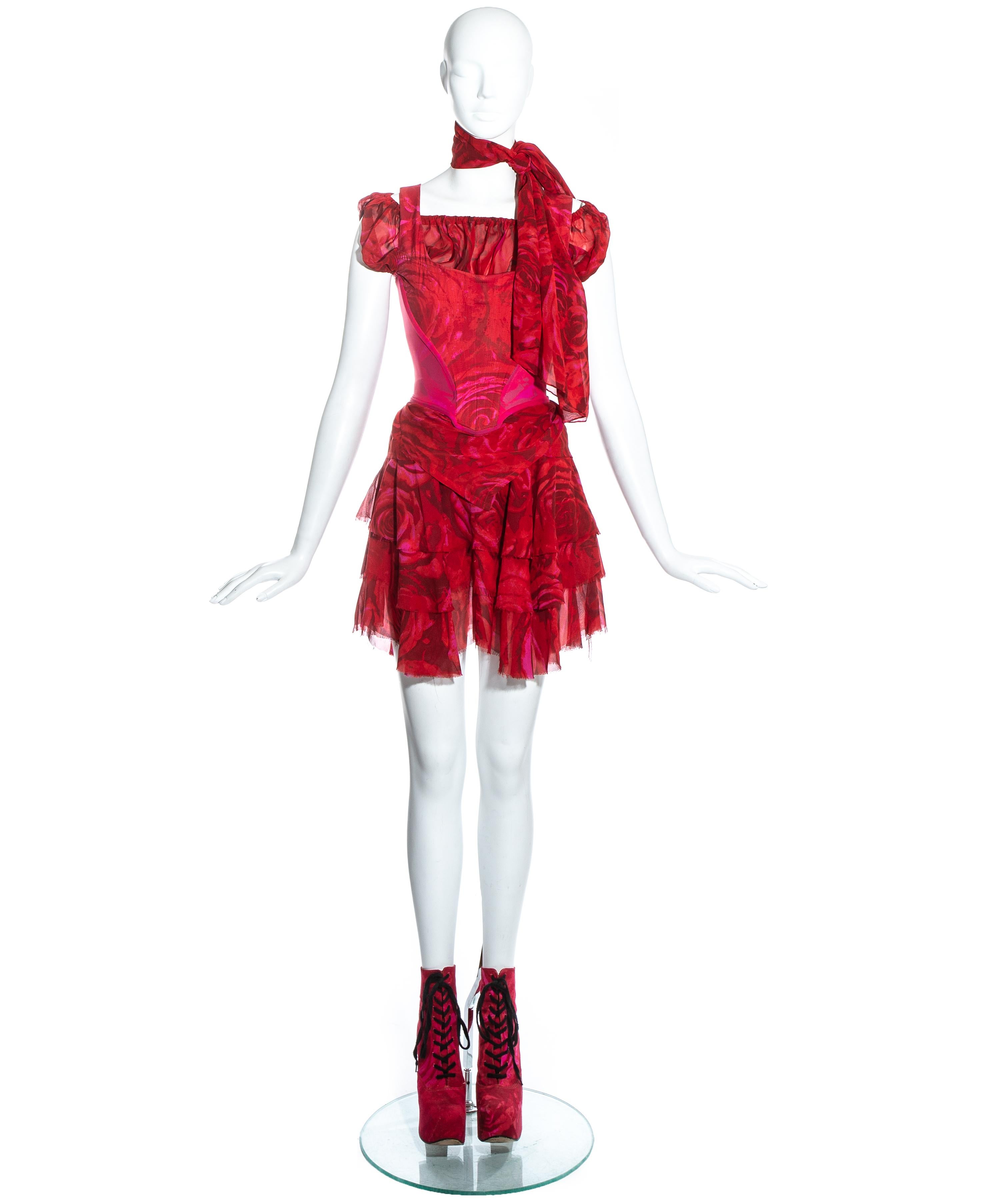 Vivienne Westwood red rose print 4 piece ensemble. Includes elevated cotton lace up platform boots (UK 6 - EU 39), layered chiffon mini skirt, chiffon blouse with elastic collar, corset with internal boning, and chiffon neck scarf. 

Spring-Summer