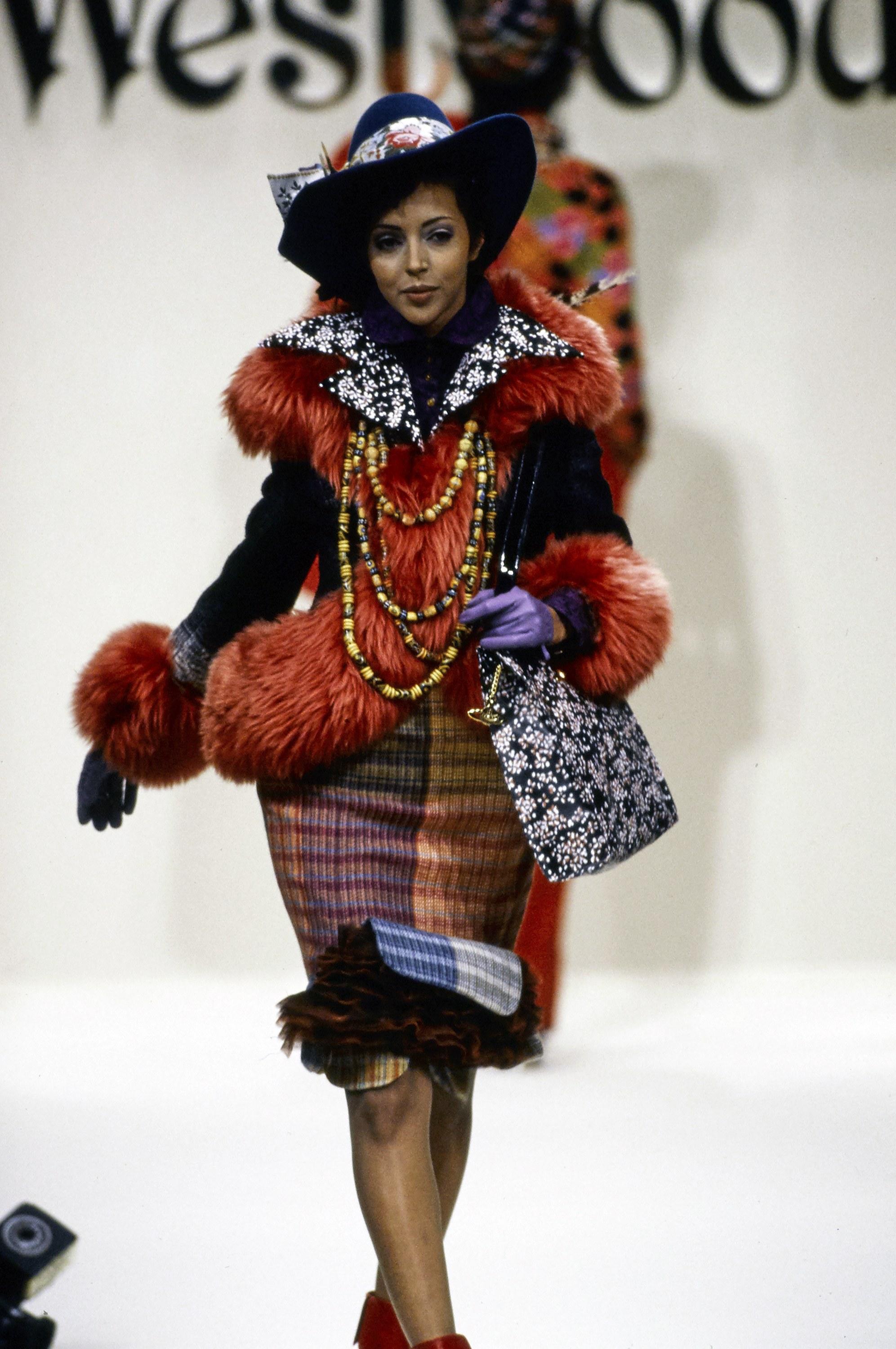 Vivienne Westwood red sheepskin oversized jacket in floral velvet. 

On Liberty, Fall-Winter 1994