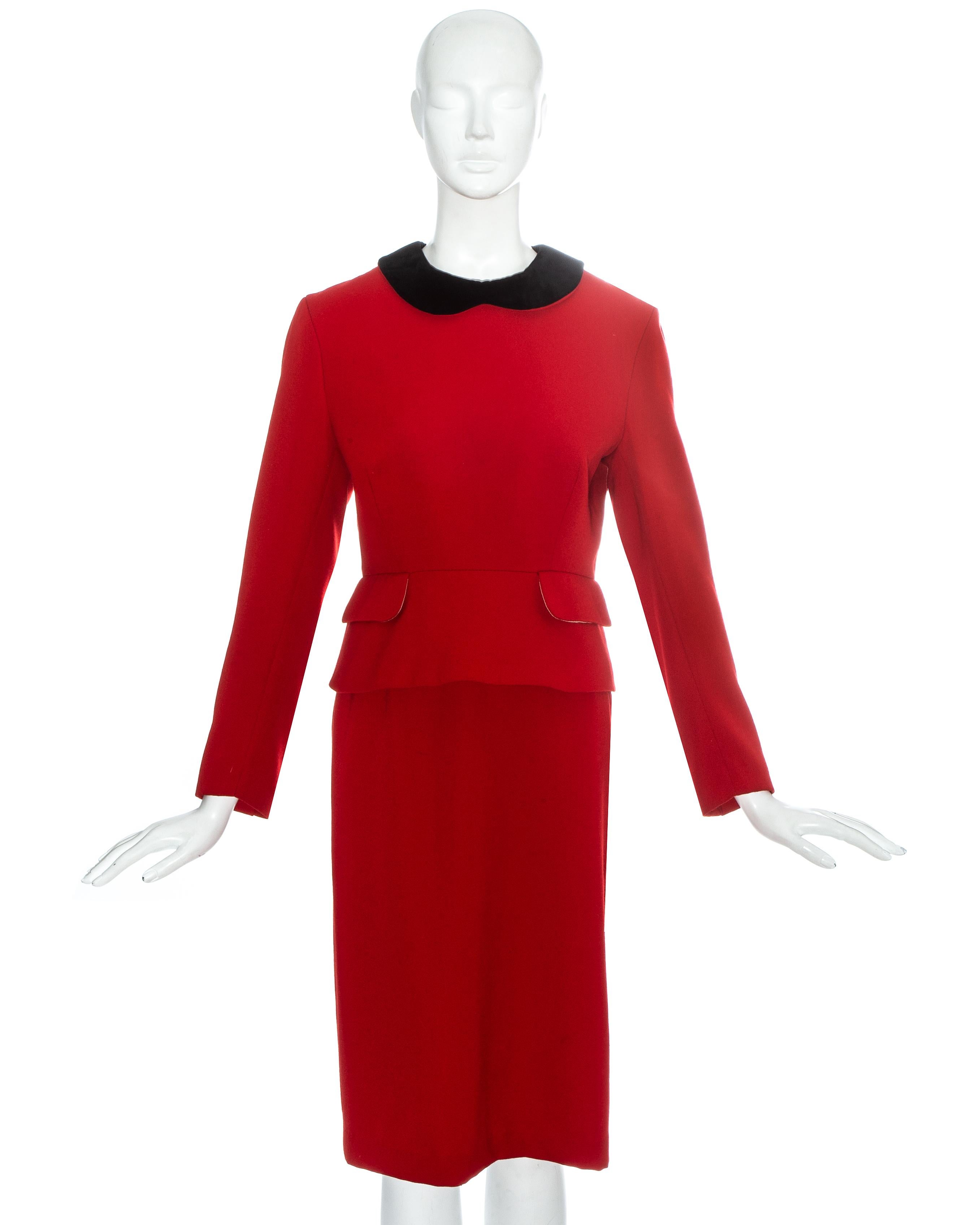 Vivienne Westwood red wool back-to-front skirt suit with gold fox engraved button fastenings at the centre back opening and black velvet Peter Pan collar.

Vivienne Westwood was photographed wearing this suit at various public events in 1991-1992,