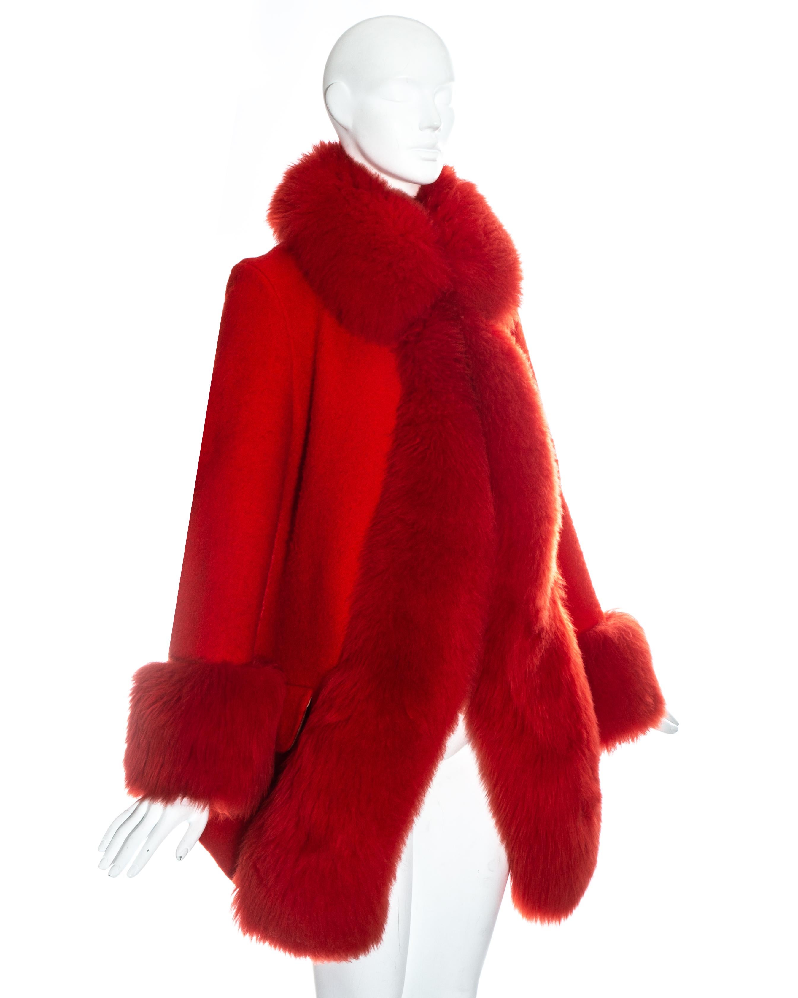 Vivienne Westwood red wool coat with oversized shearling cuffs, collar and trim. 

Fall-Winter 1994