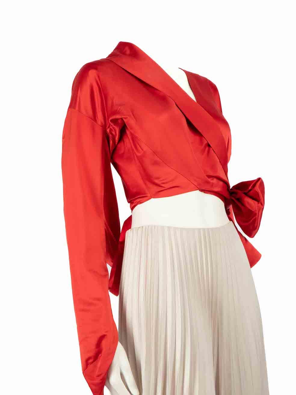 CONDITION is Very good. Minimal wear to jacket is evident. Minimal wear to the back and sleeves with discolouration marks and abrasion on the draped details. The size and composition label are missing on this used Vivienne Westwood designer resale