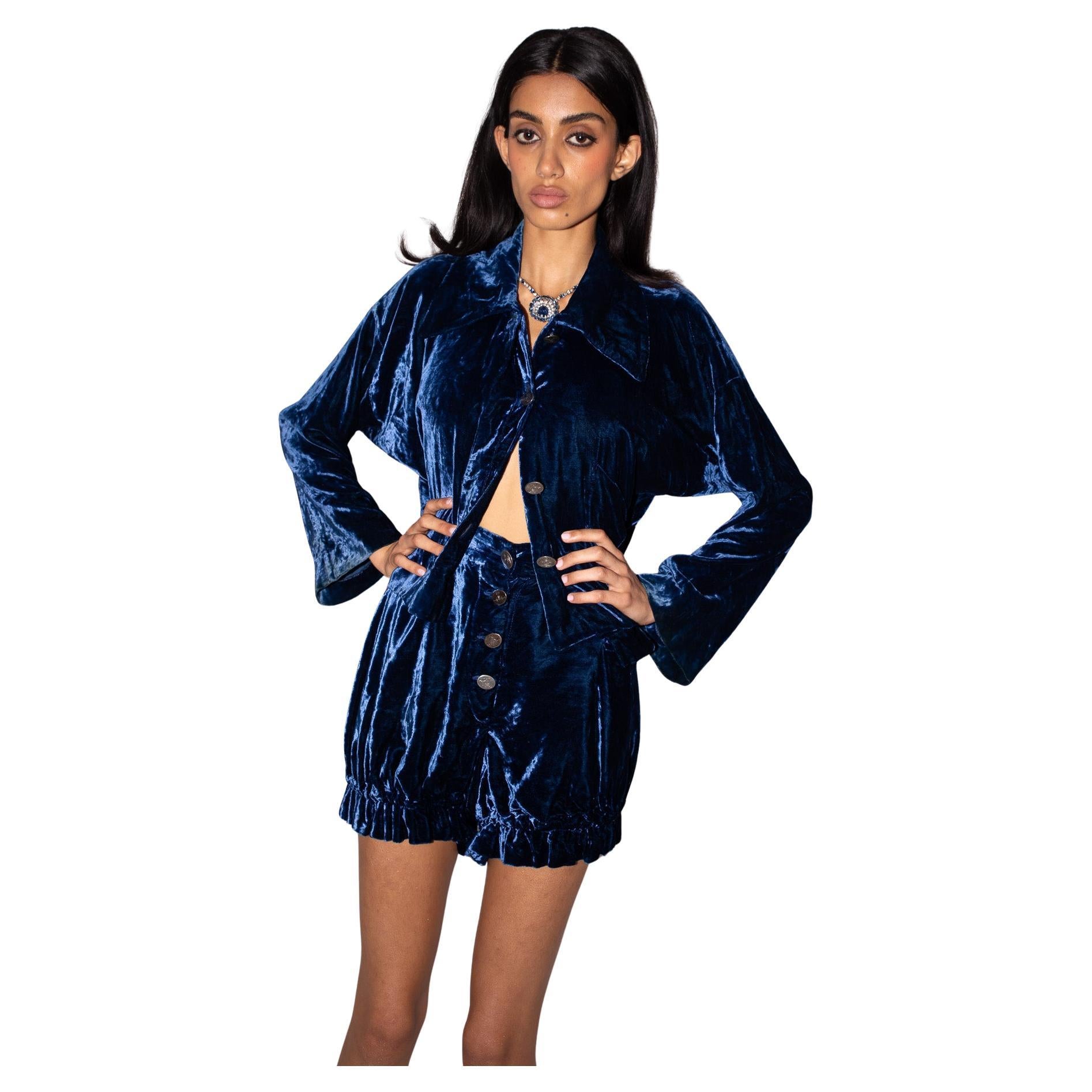 Dating to Vivienne Westwood’s iconic S/S 1985 'Mini Crini' collection, this fabulous and ultra rare suit set is made from luxe blue velvet & comprises a loose fitting jacket with oversized collar and slightly cropped sleeves and a pair of high