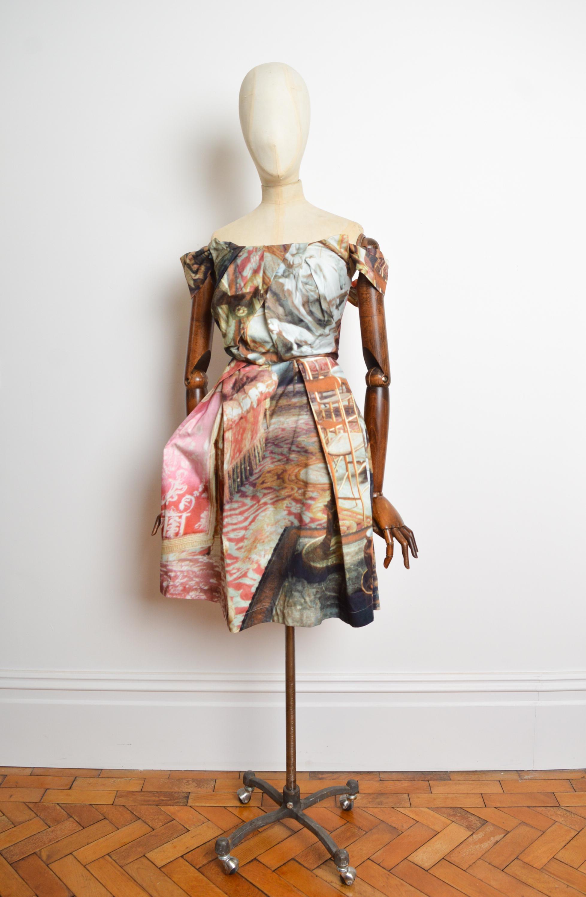 A Fabulous Vivienne Westwood 'Anglomania collection' liberty print Saloon dress. With renaissance imagery depicted throughout. Fitted at the waistline with a concealed zip up back closure. 
Size; Recommended UK 12. Label 46
Measurements are provided
