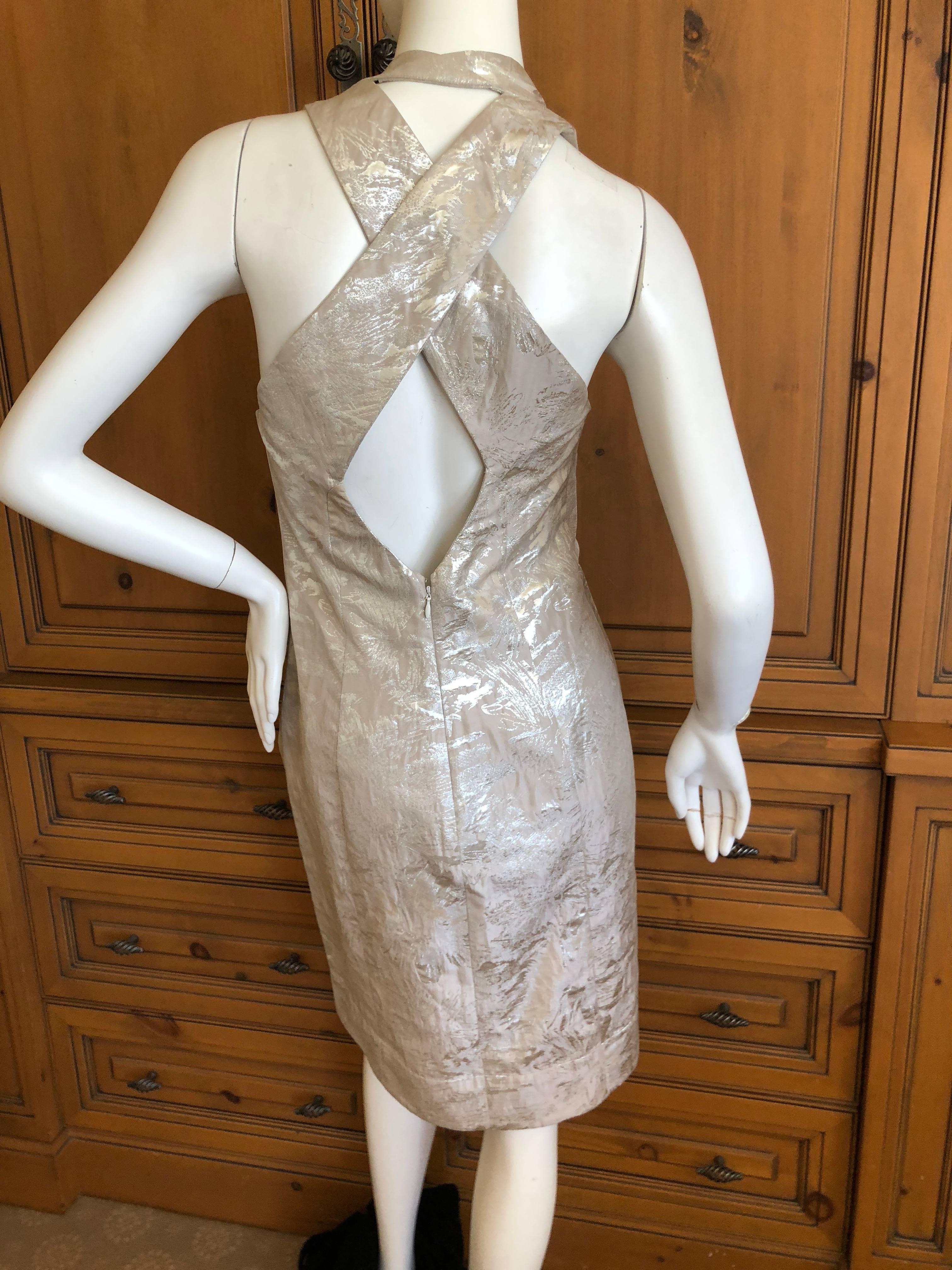 Vivienne Westwood Red Label Silver Brocade Dress with Cross Back
 New with Tags
Size 40
Bust 36'
Waist 29