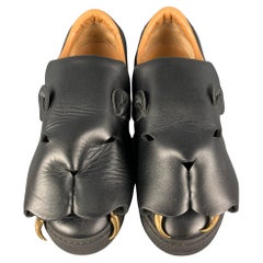 VIVIENNE WESTWOOD Slip-On-Turnschuhe aus Leder mit schwarzen Ausschnitten, Größe 10