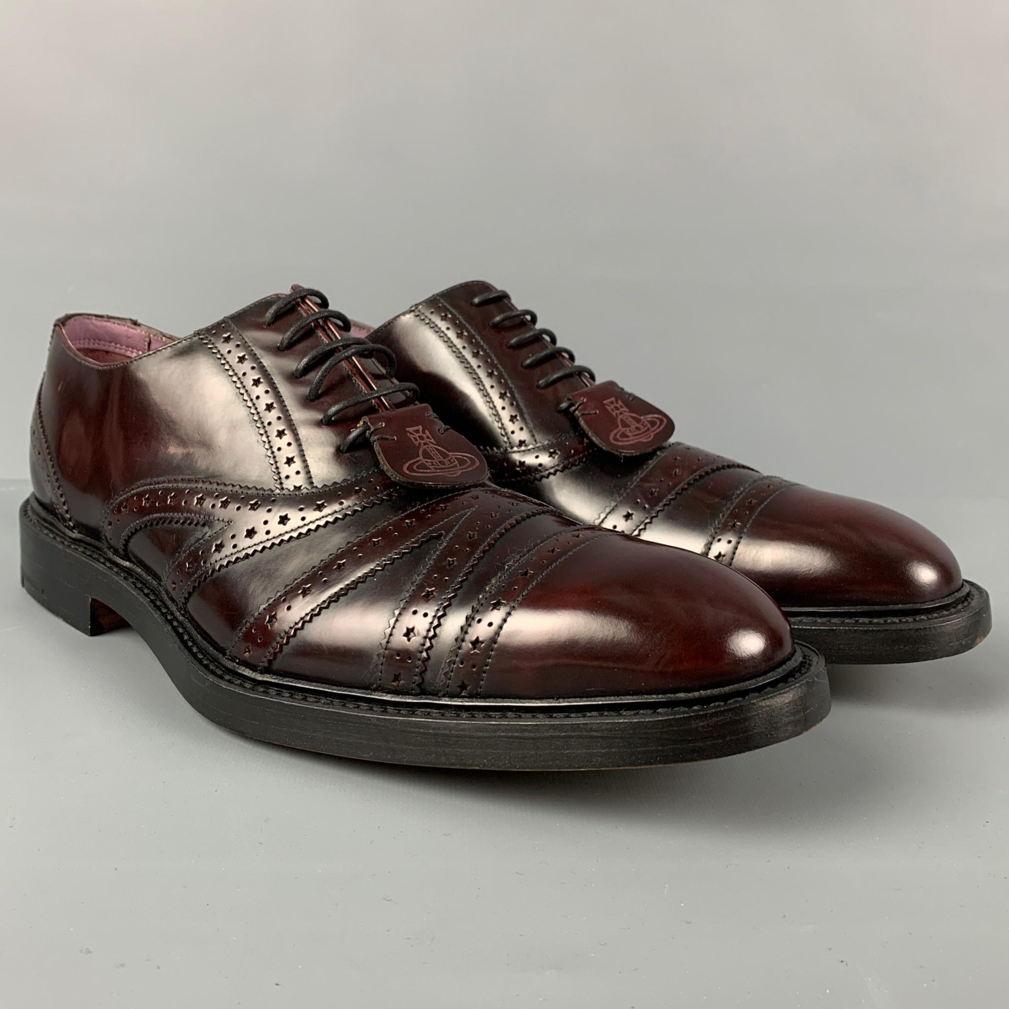 VIVIENNE WESTWOOD MAN shoes burgundy antique leather featuring perforated details, round toe, and a lace up closure. Handmade in England. 

Brand New. 
Marked: 3591FW76 10 F
Original Retail Price: $995.00

Outsole: 13.5 in. x 4.75 in. 