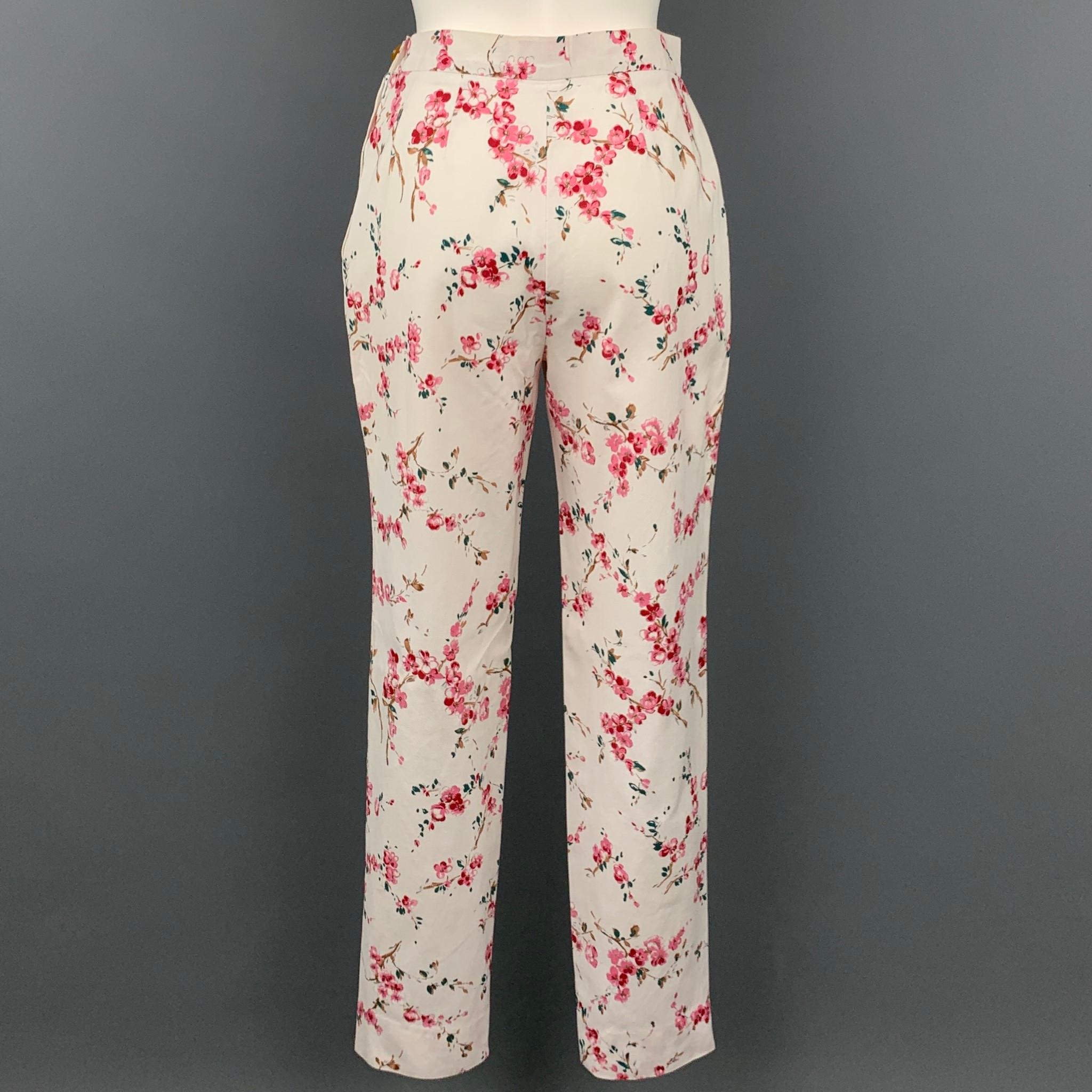 VIVIENNE WESTWOOD casual pant comes in a white & pink floral cotton featuring a high waisted style, pleated, and a side zipper closure. Moderate wear with some color transfer.

Very Good Pre-Owned Condition.
Marked: 44

Measurements:

Waist: 27