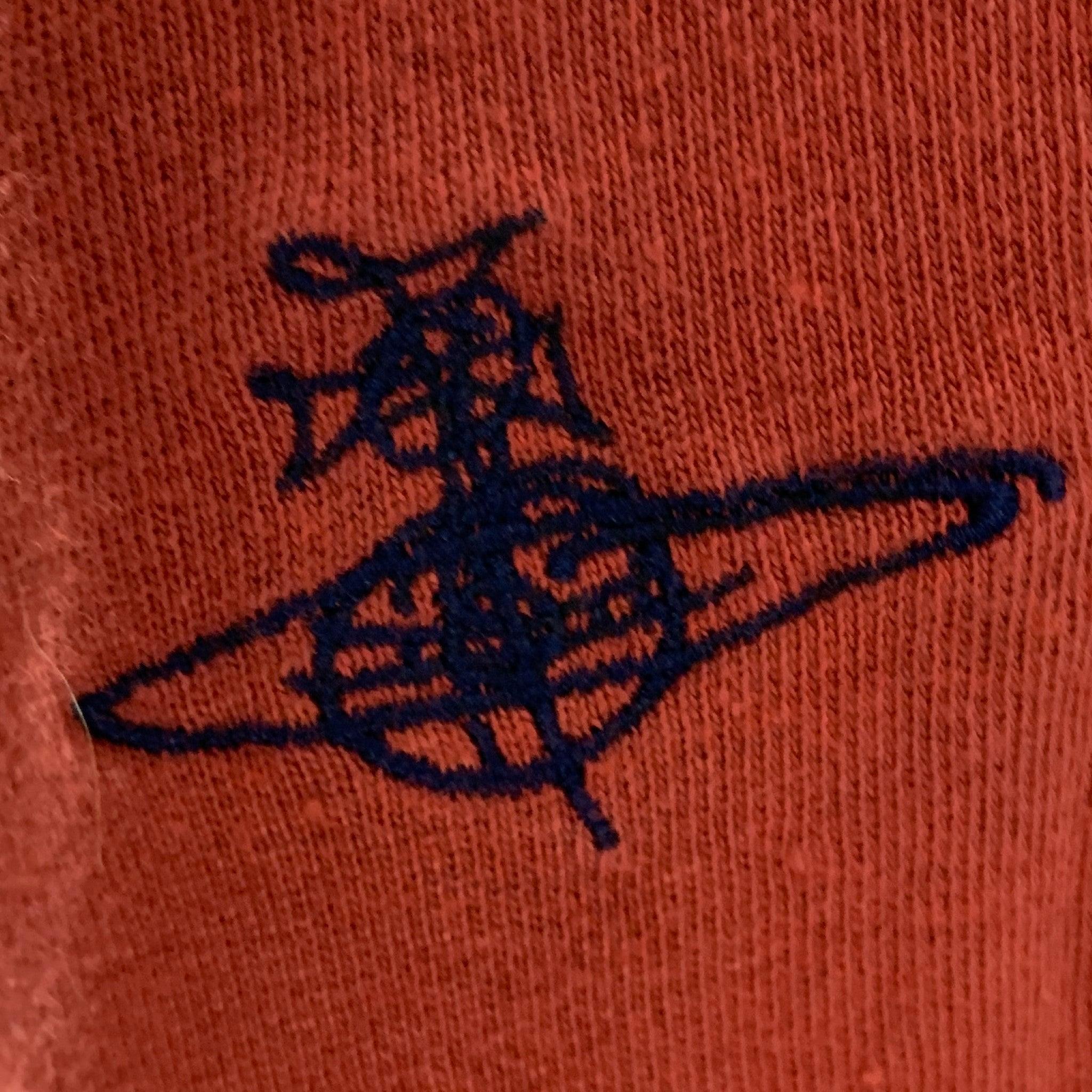 VIVIENNE WESTWOOD sweatpants comes in a orange french terry knit material featuring stripped blue and red woven fabric accents, a drawstring waistband and a button closure. Very Good Pre-Owned Condition. Minor marks at waistband. 

Marked:   S