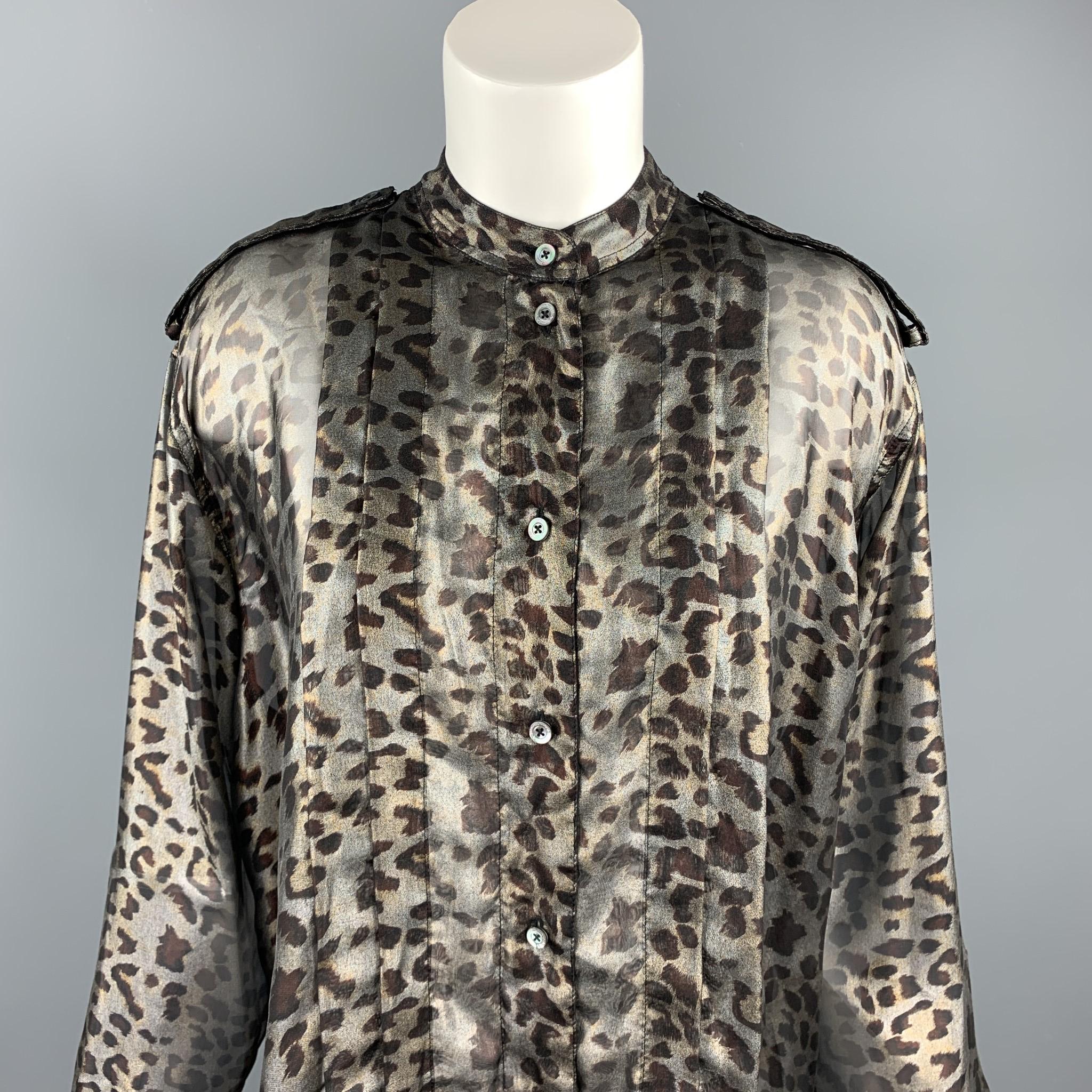VIVIENNE WESTWOOD ANGLOMANIA shirt comes in a silver & brown leopard polyester featuring a loose fit button up style, epaulettes, front pleated, and a nehru collar. Made in Romania.

Excellent Pre-Owned Condition.
Marked: IT