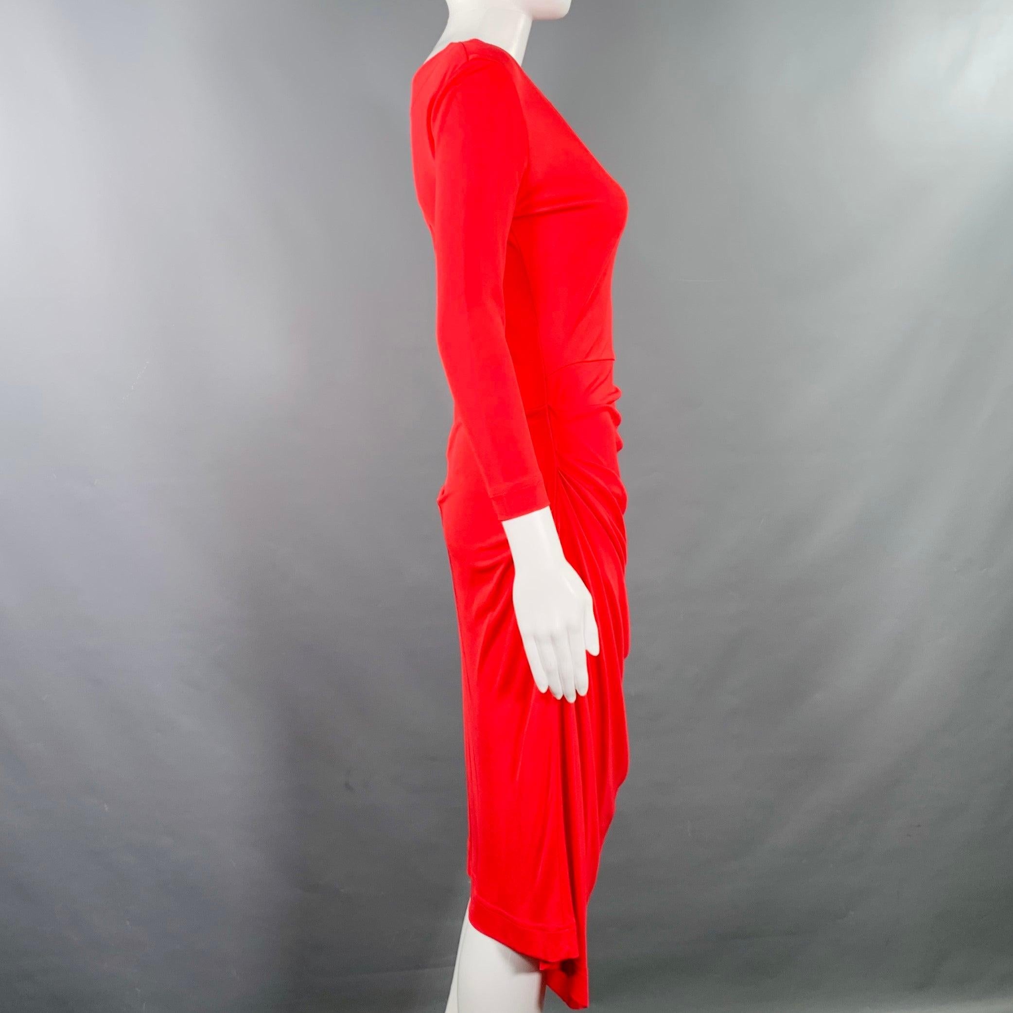 VIVIENNE WESTWOOD ANGLOMANIA dress
in a stretchy red viscose fabric featuring a form fitting design with ruched details, long sleeves, and midi length. Made in Italy.Very Good Pre-Owned Condition. Minor marks and signs of wear. 

Marked:   XS