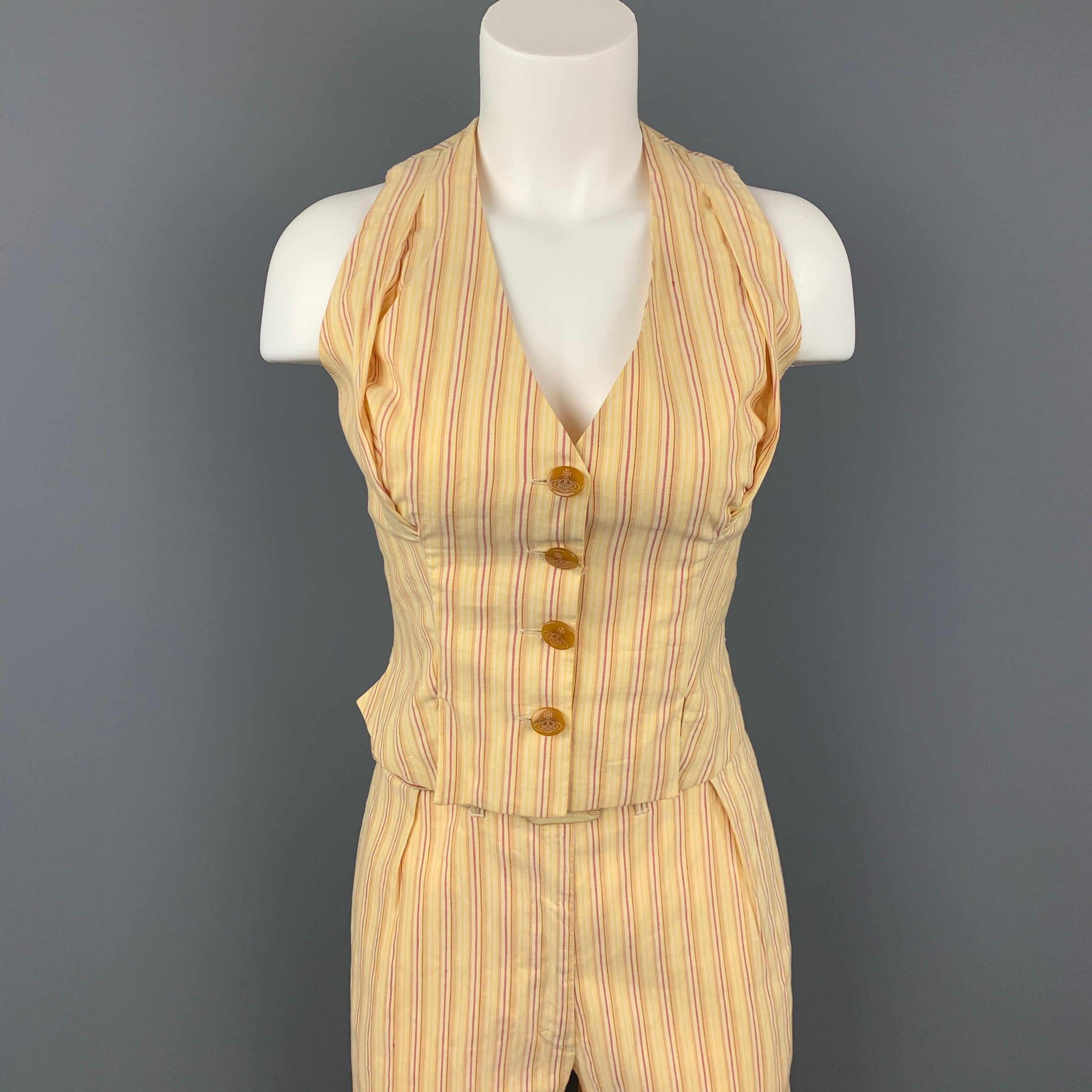 VIVIENNE WESTWOOD Spring 1995 vest and pant set comes in a yellow & red stripe linen with a full liner featuring a pleated design, front slits, cropped back, buttoned closure, and includes matching belted pants. Moderate wear. Made in Italy. 

Very