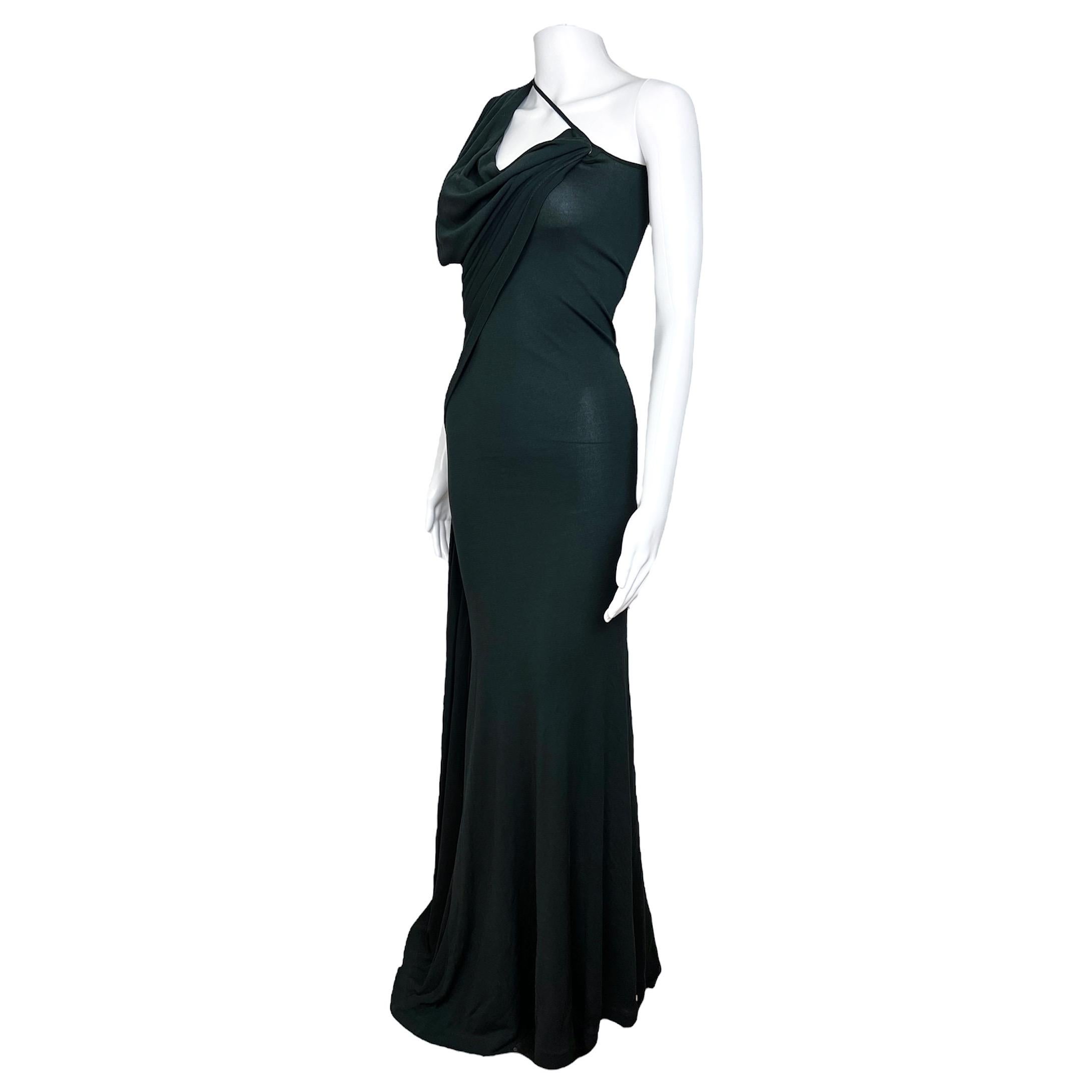 Incredible Vivienne Westwood black one shoulder gown with draped details from Spring Summer 1997 collection in the style of the dresses shown on the runway that season. Size is XS/S.

Condition: Excellent / Flaws: None