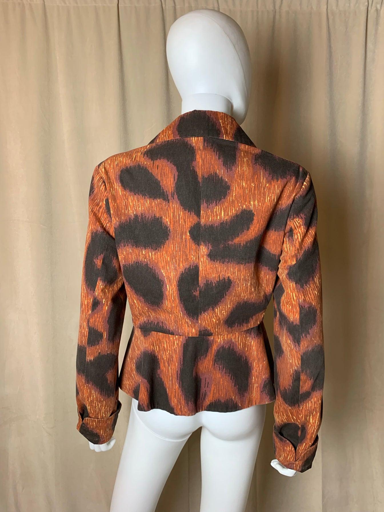 This gorgeous leopard jacket is from one of Vivienne Westwood’s most iconic runways. It occurred in October 1993, for the Fall/Winter 1994 collection. Leopard print was the theme of the runway, as the carpet of the runway was leopard print as well.