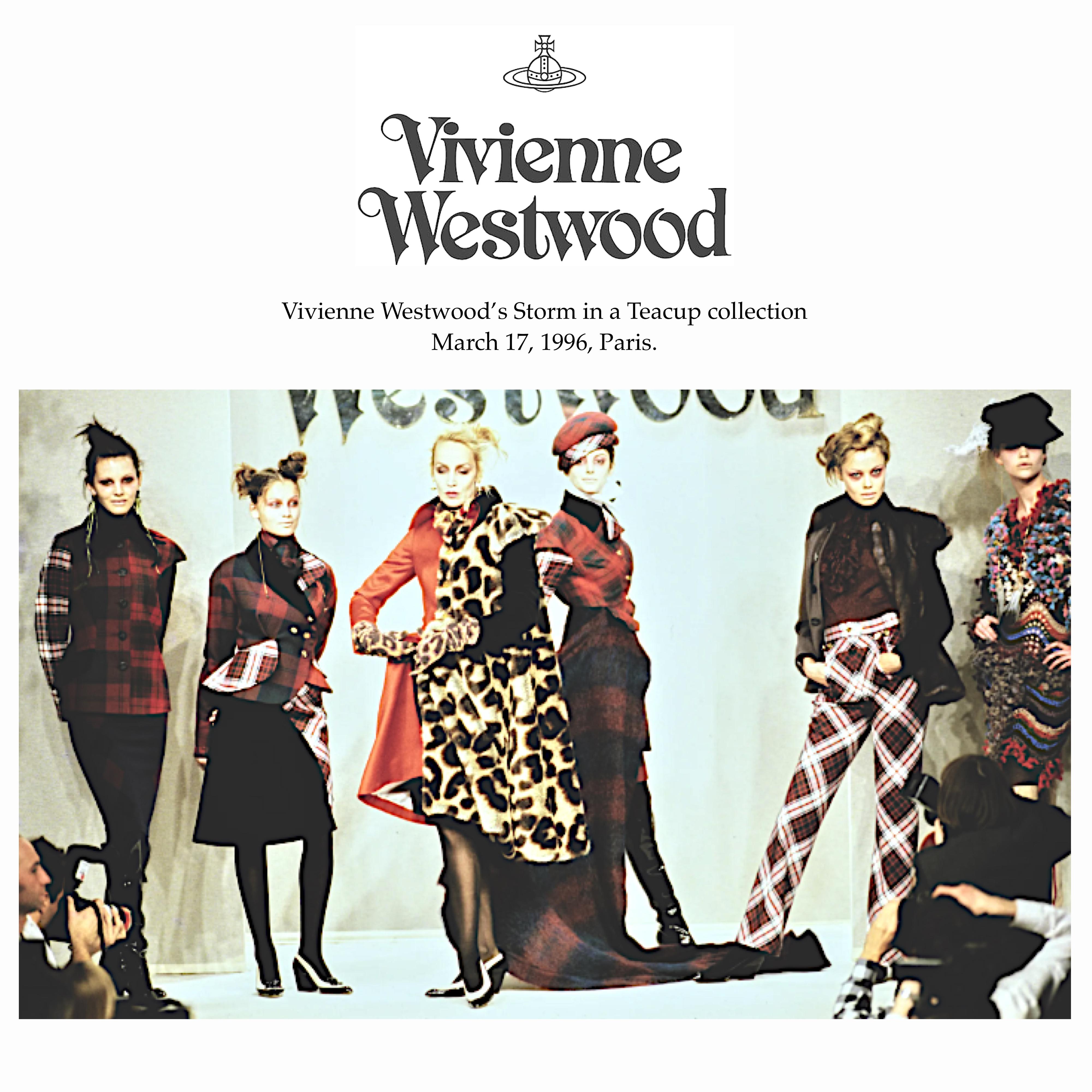 Collectible Vivienne Westwood  “Storm in a Teacup” fall 1996 collection vintage jacket.
The asymmetric blazer jacket is made up of an assembly of Lochcarron of Scotland wool tartans and black cotton velvet. 
Made in England
US 8 - UK 10 - French 38