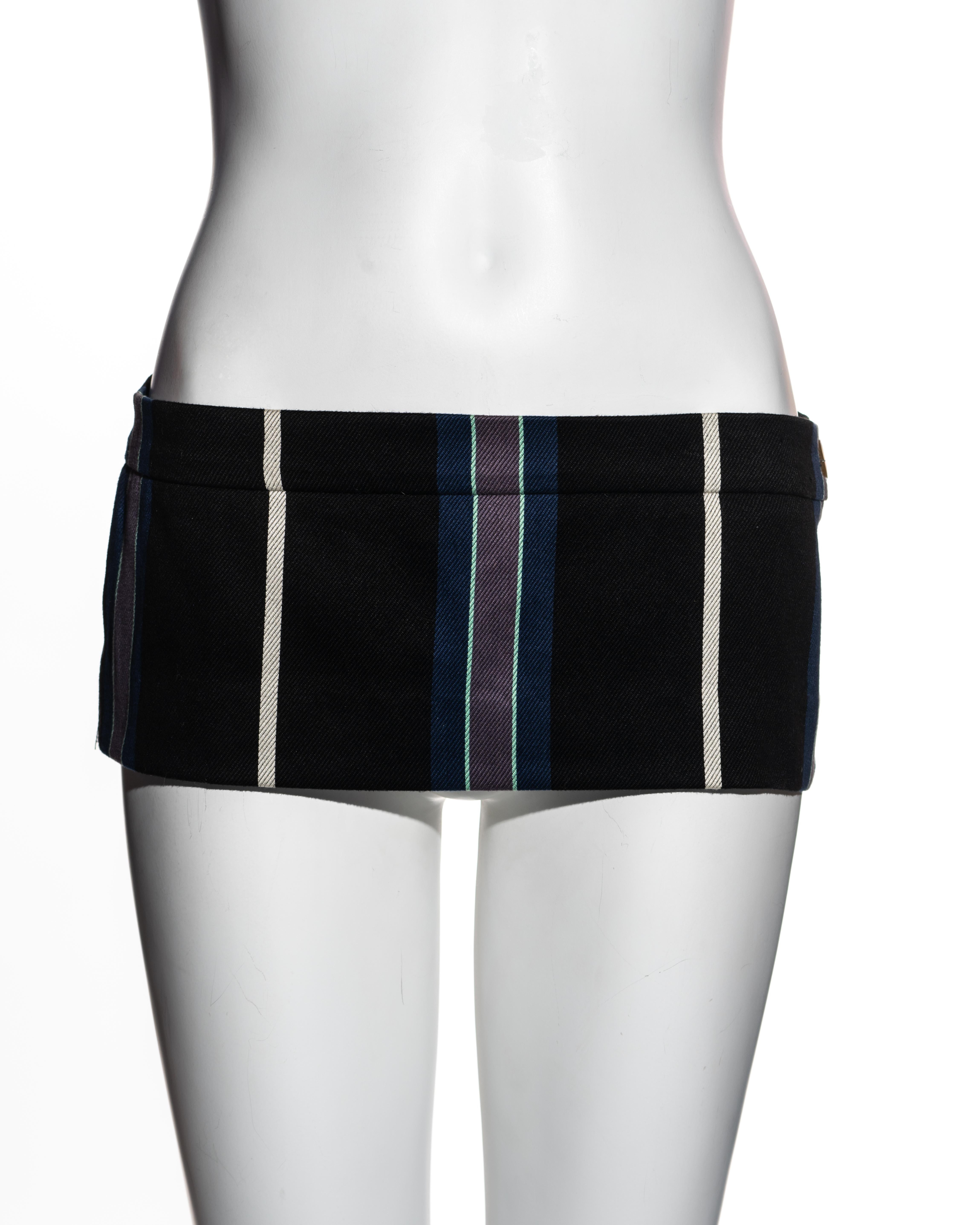 ▪ Vivienne Westwood striped wool micro mini skirt 
▪ Navy, grey, turquoise and white stripes with black base 
▪ Length: 16 cm / 6.3 inch
▪ Orb etched button 
▪ Concealed zipper at side seam 
▪ Back vent 
▪ An iconic design worn on the runway by Kate